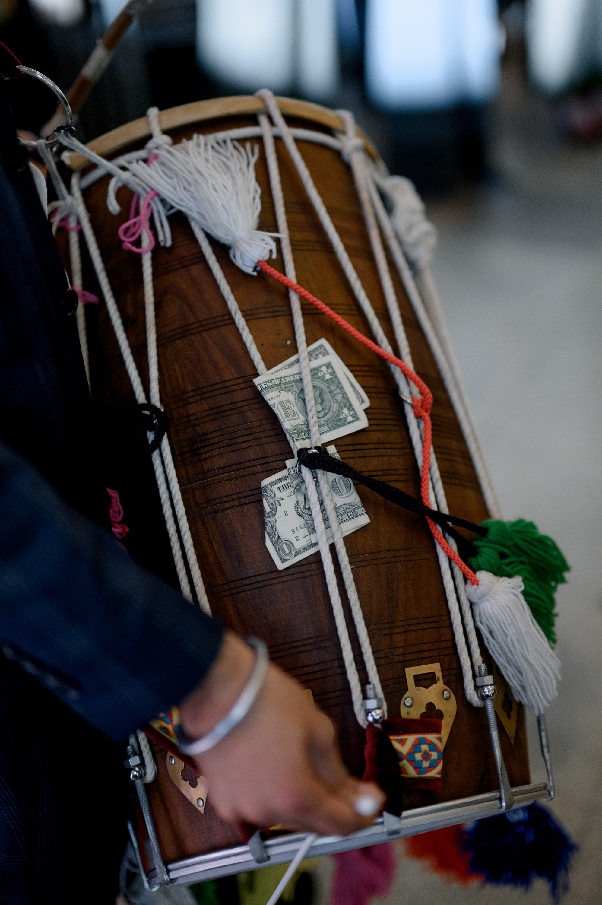 a suitcase with a bunch of money on it