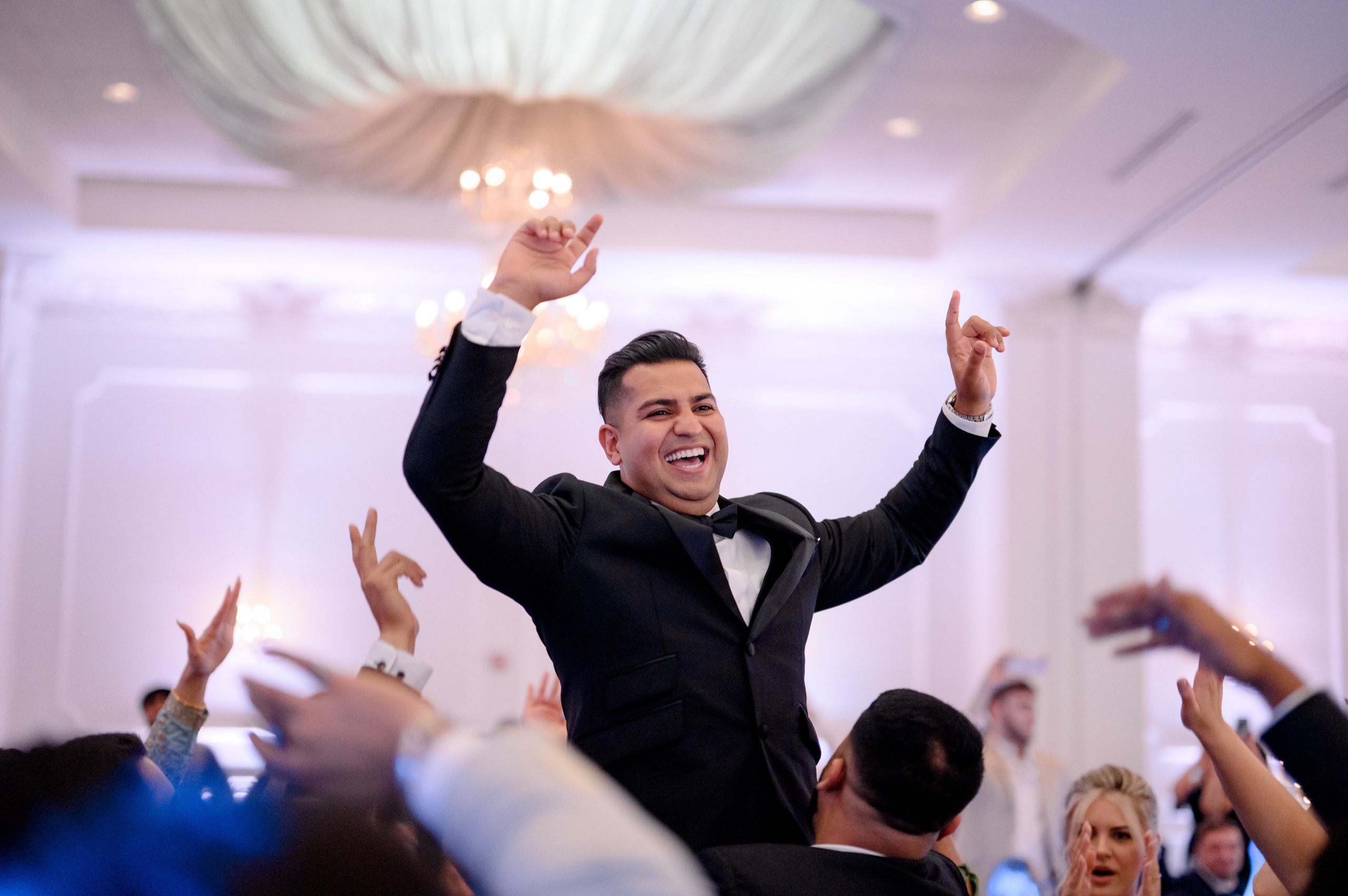 a man in a tuxed suit