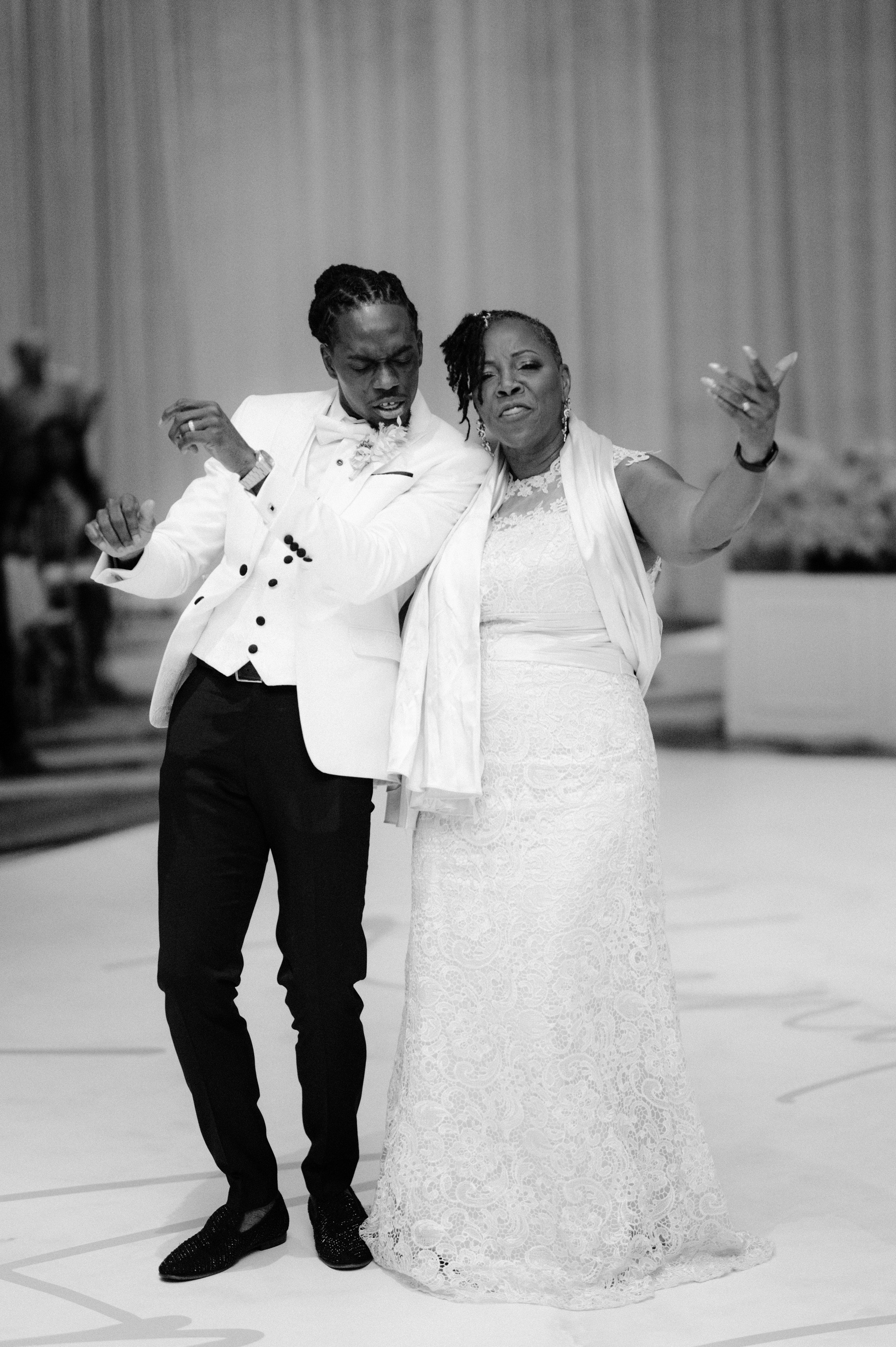 a bride and groom dancing at their wedding