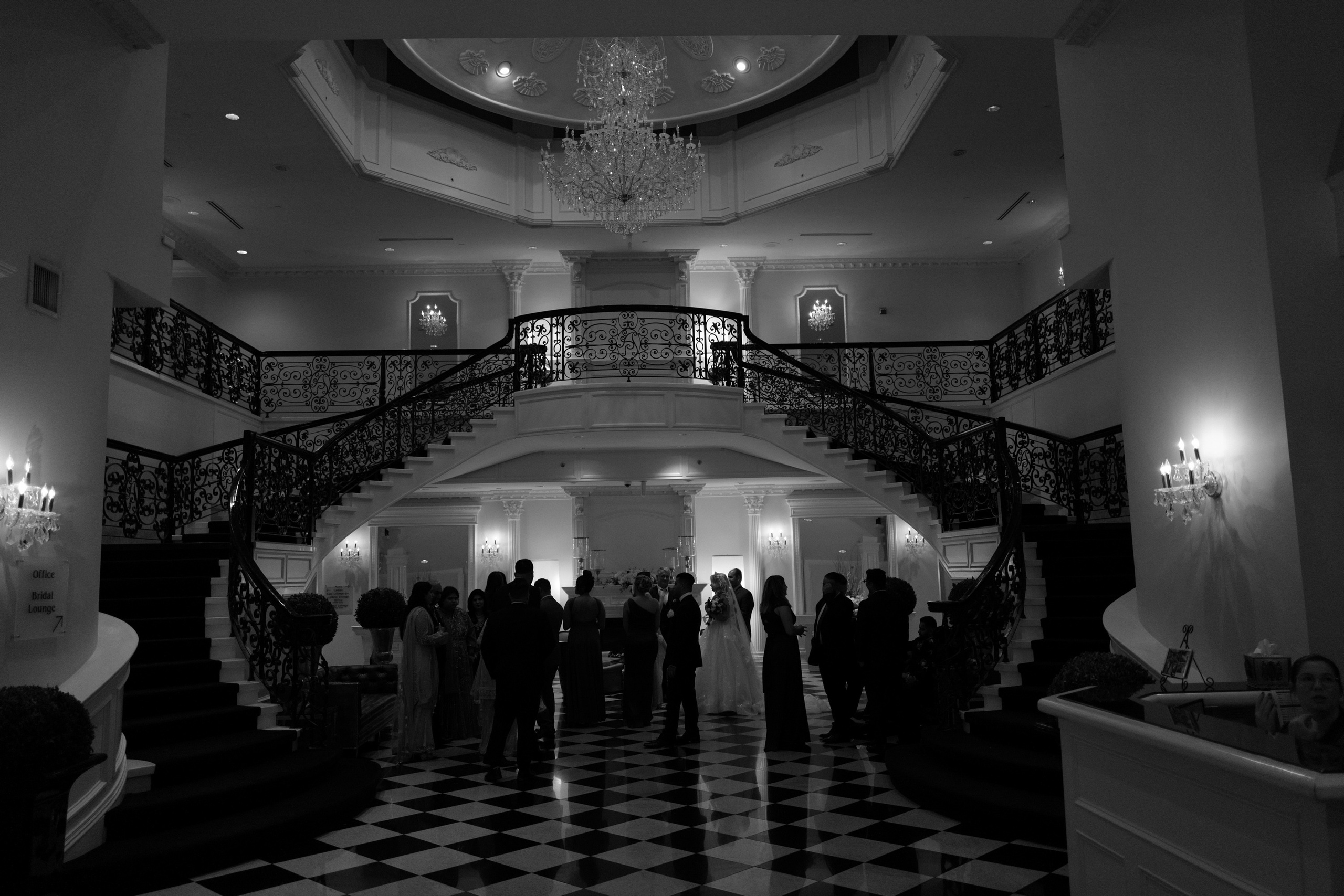 a group of people standing in a room