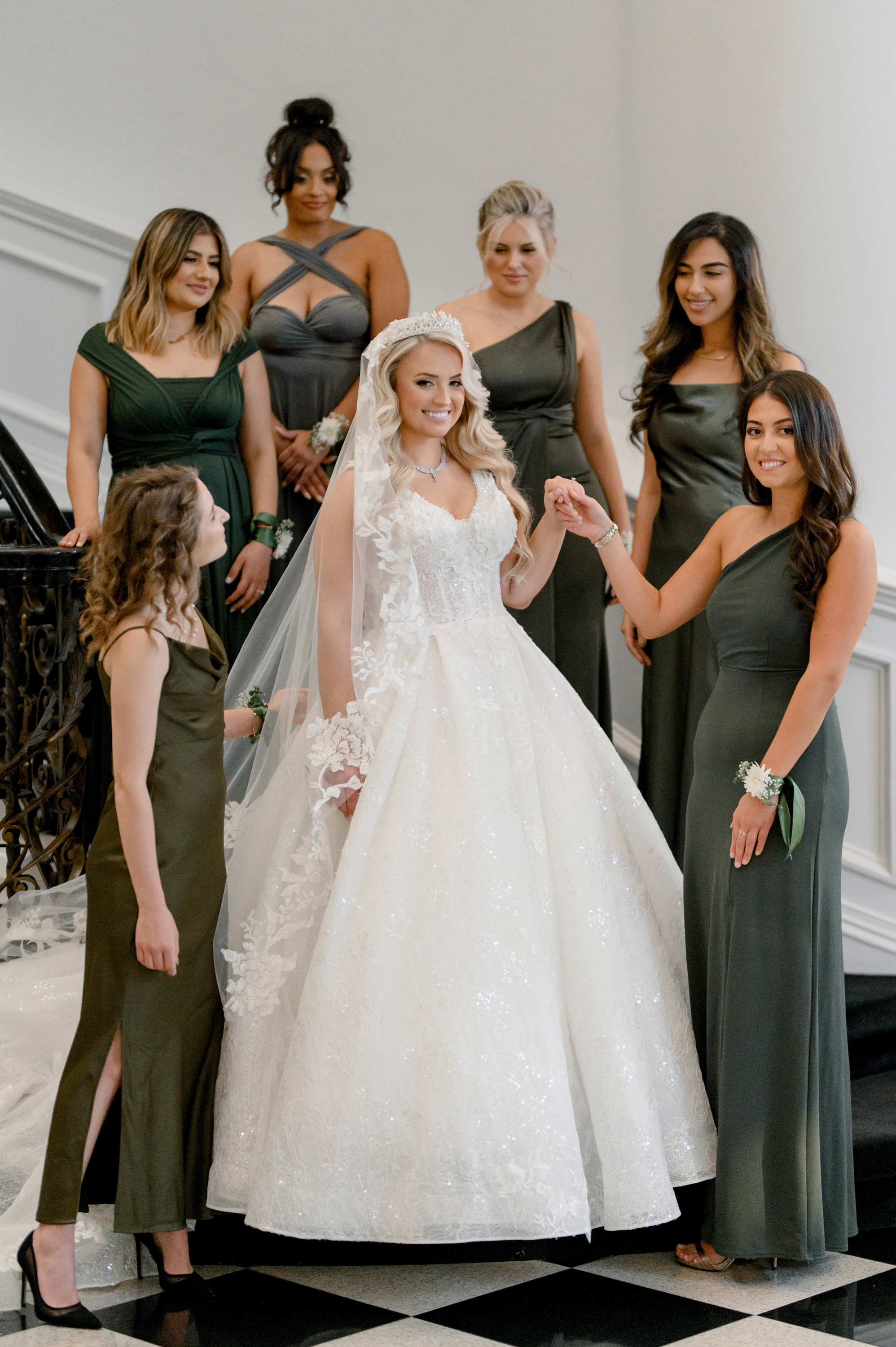 a bride and her bridesmaids in a wedding dress