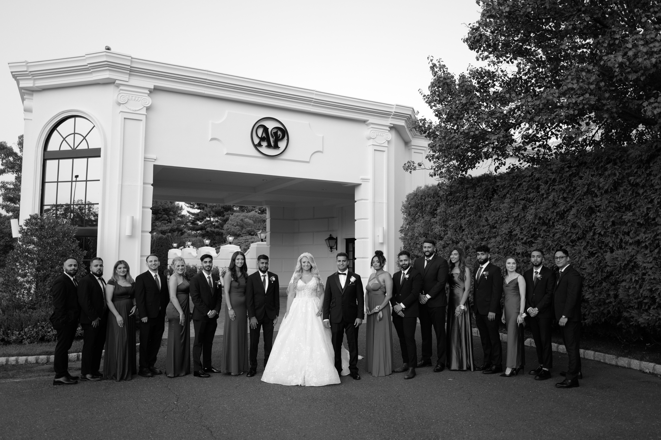 a group of people standing in front of a building