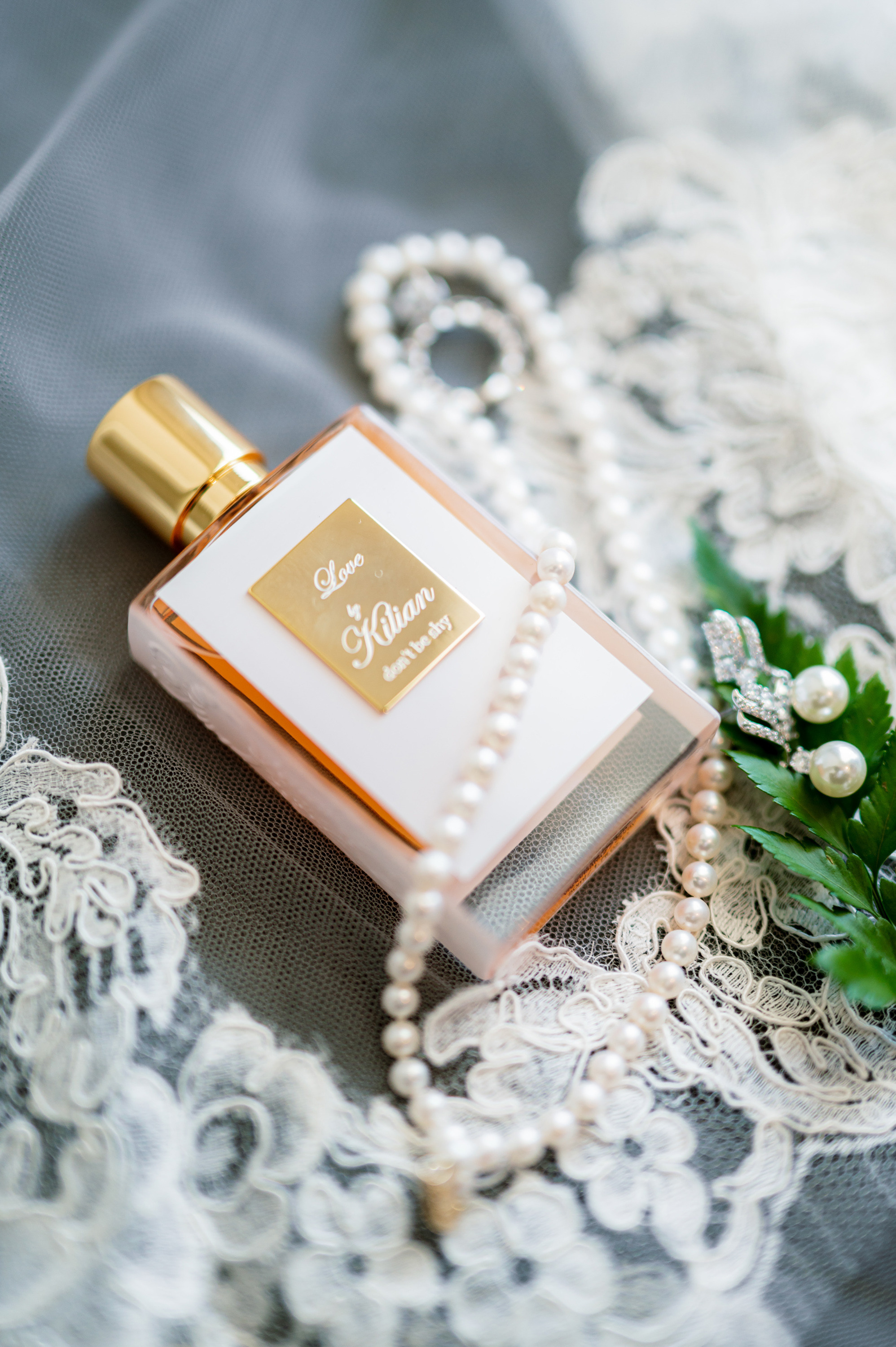 a bottle of perfume sitting on a table