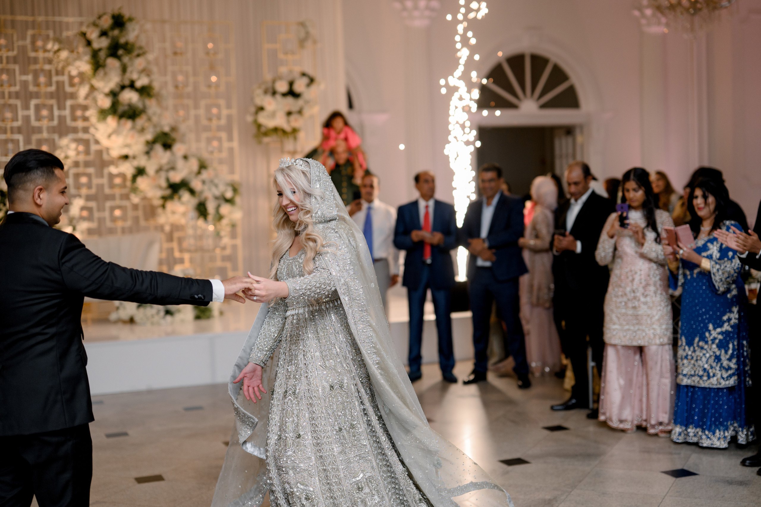 a bride and groom dancing together