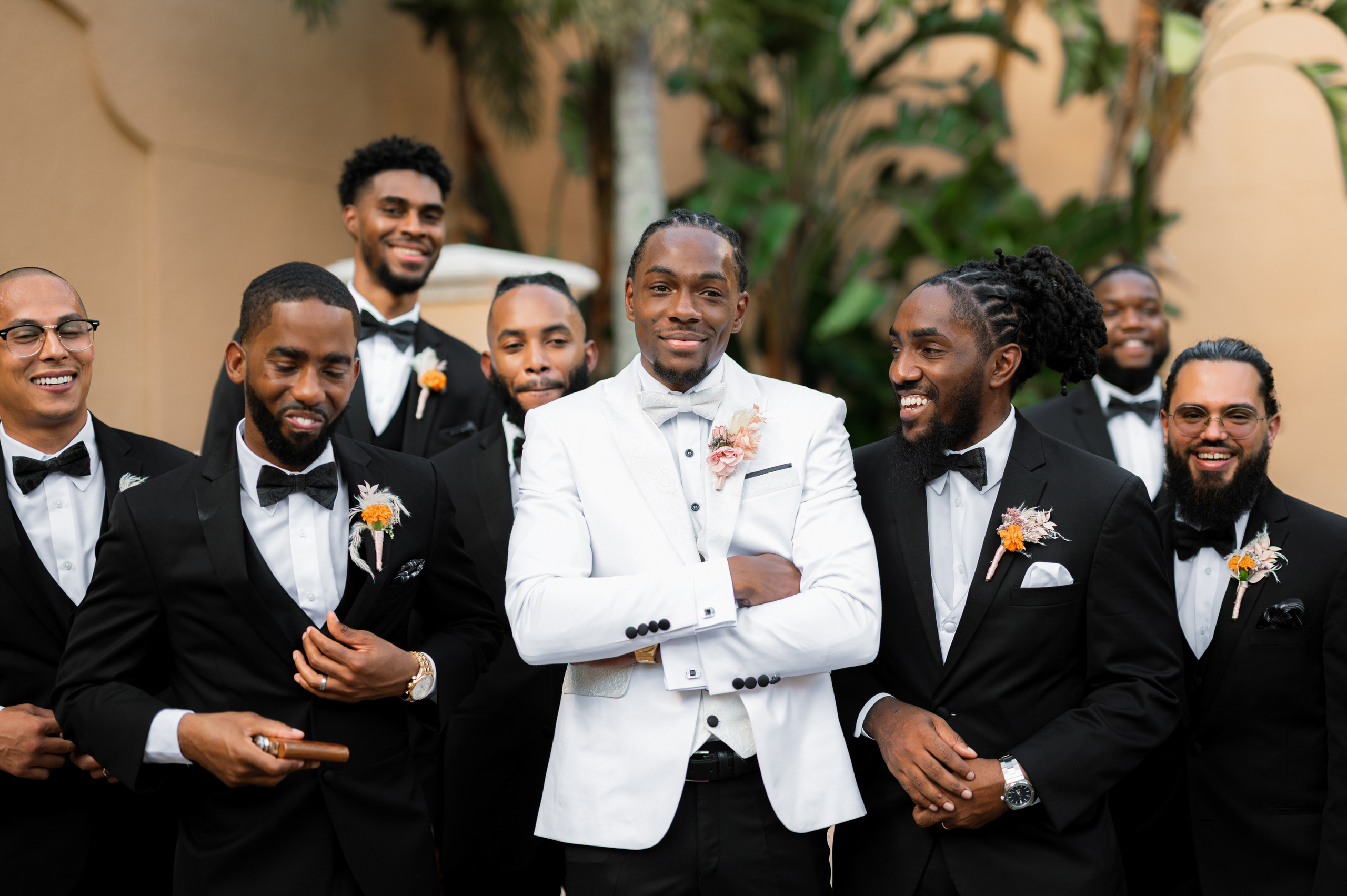 a group of men in tuxed suits