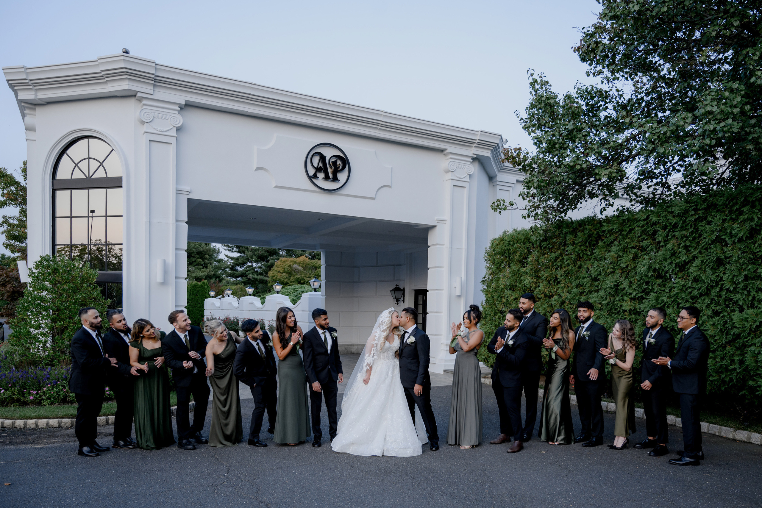 a group of people standing in front of a building