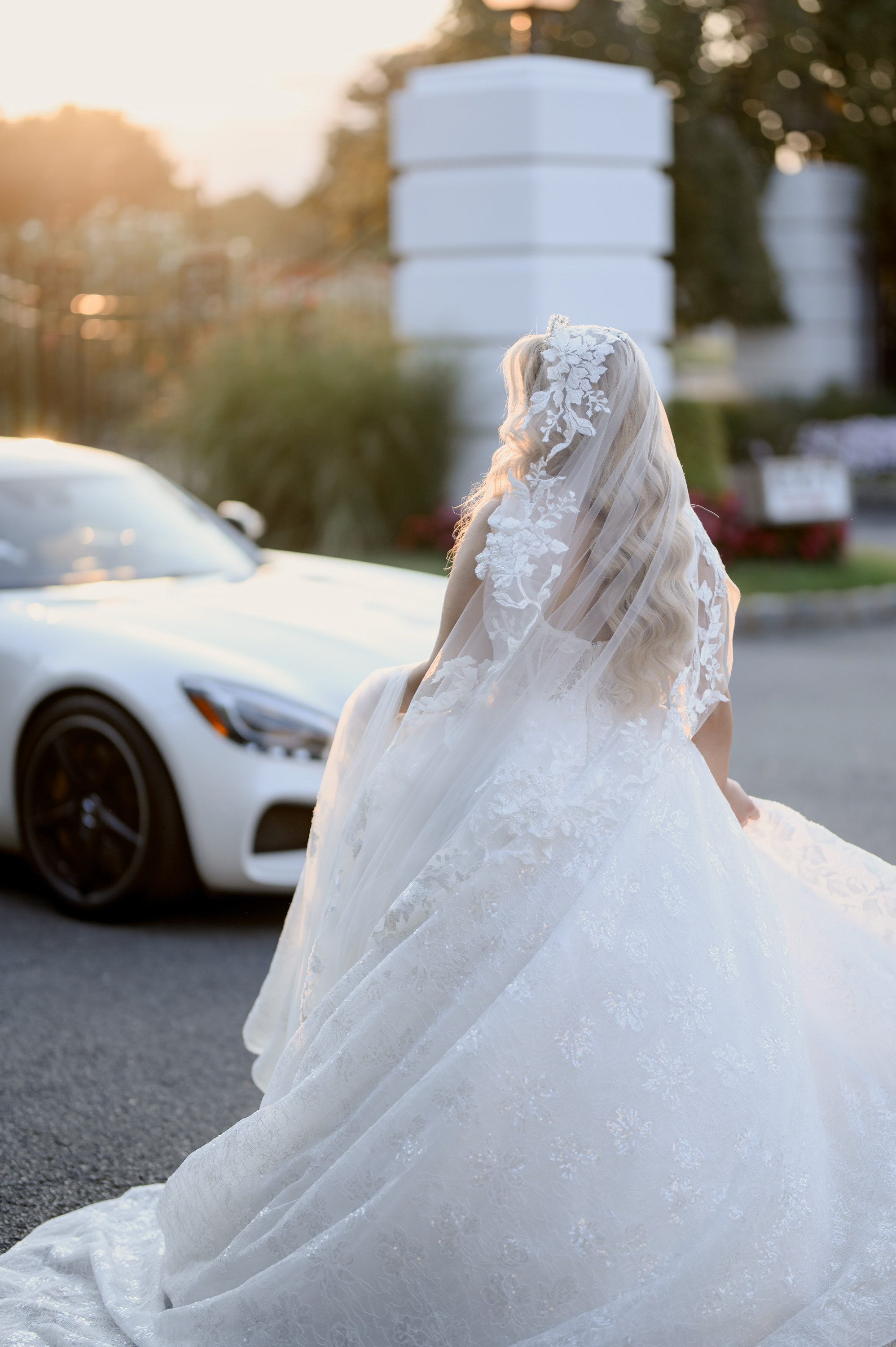a bride walking down the street in her wedding dress