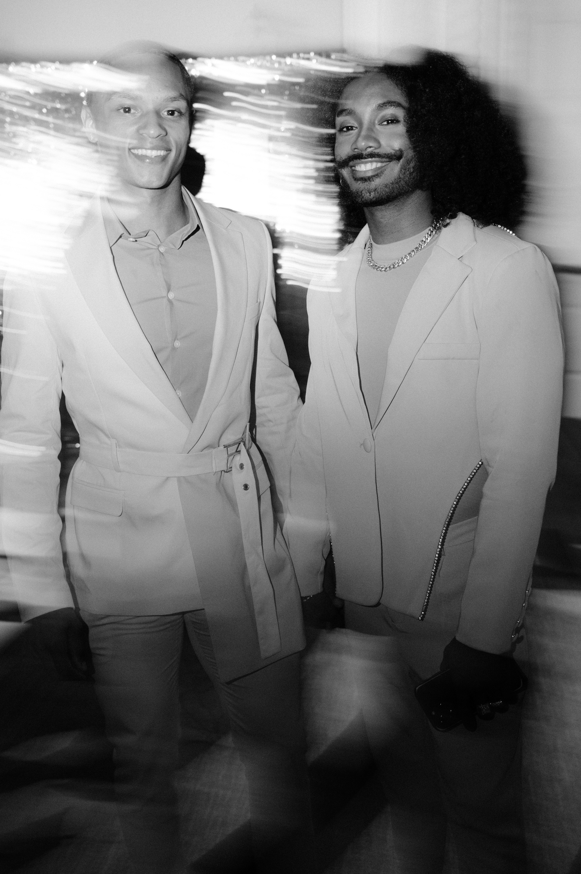 two people in suits