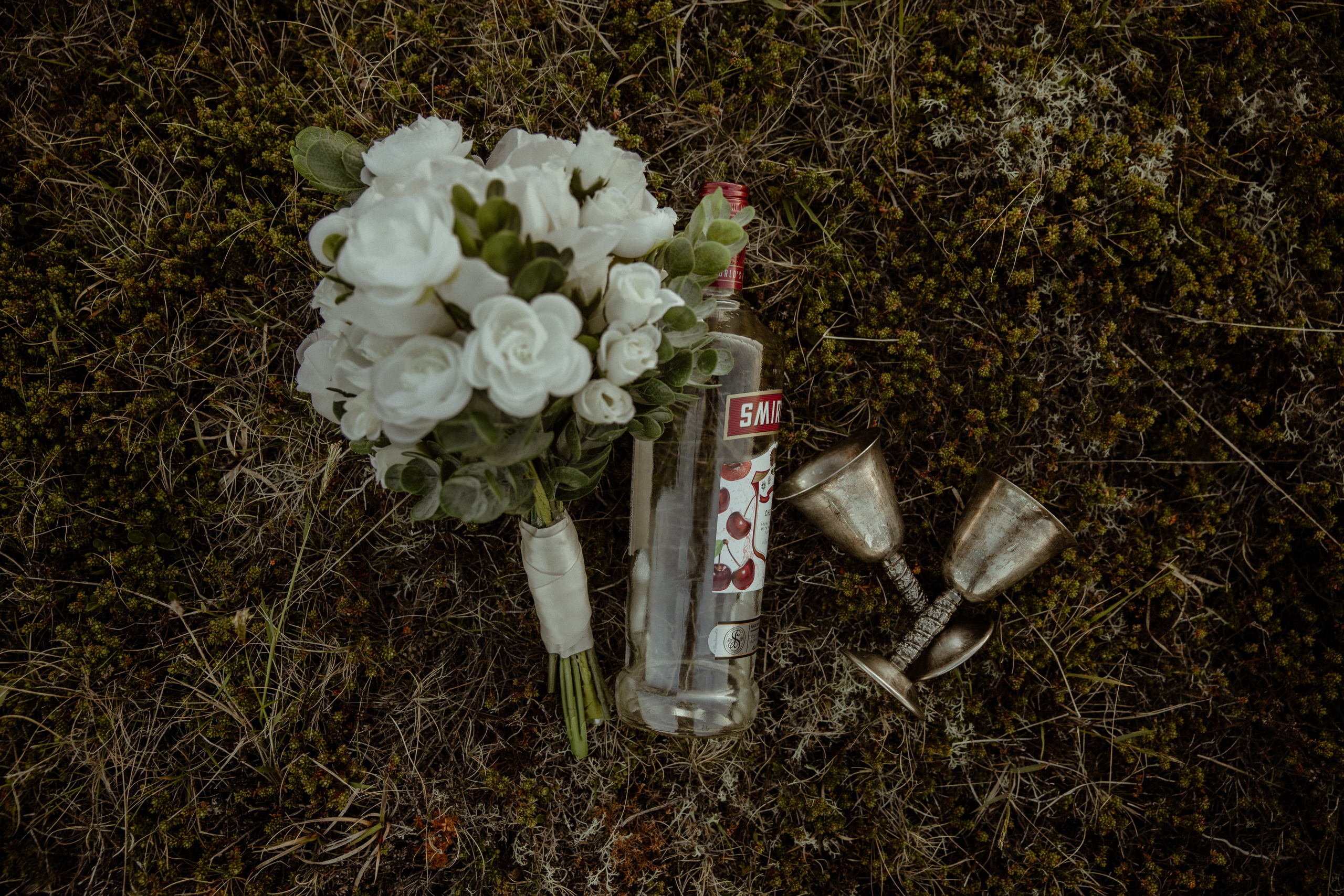 Iceland elopement at Budir with midnight sun wedding photos at black sand beach. Iceland elopement photographer & videographer