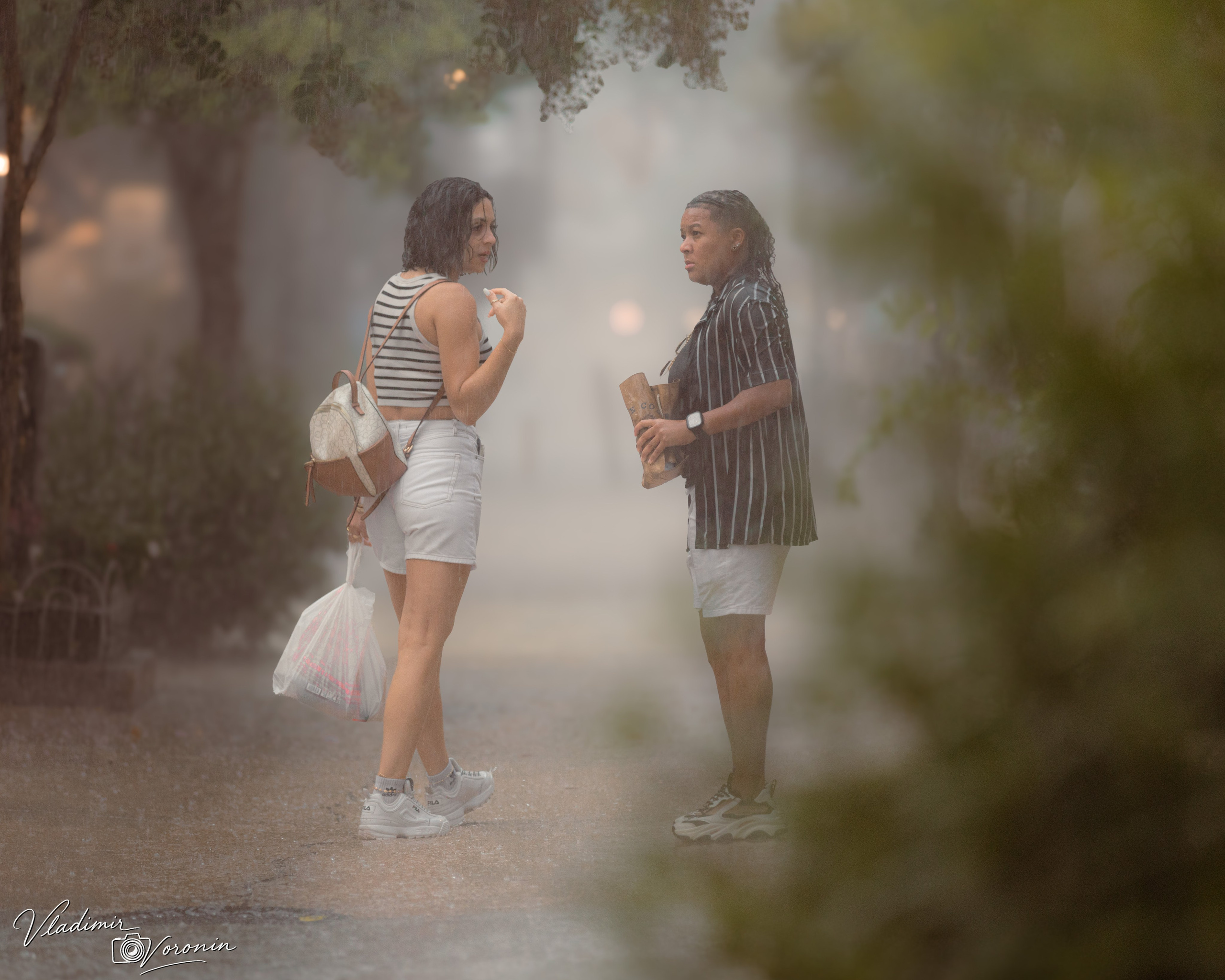 Rain in downtown. Photographer St. Augustine