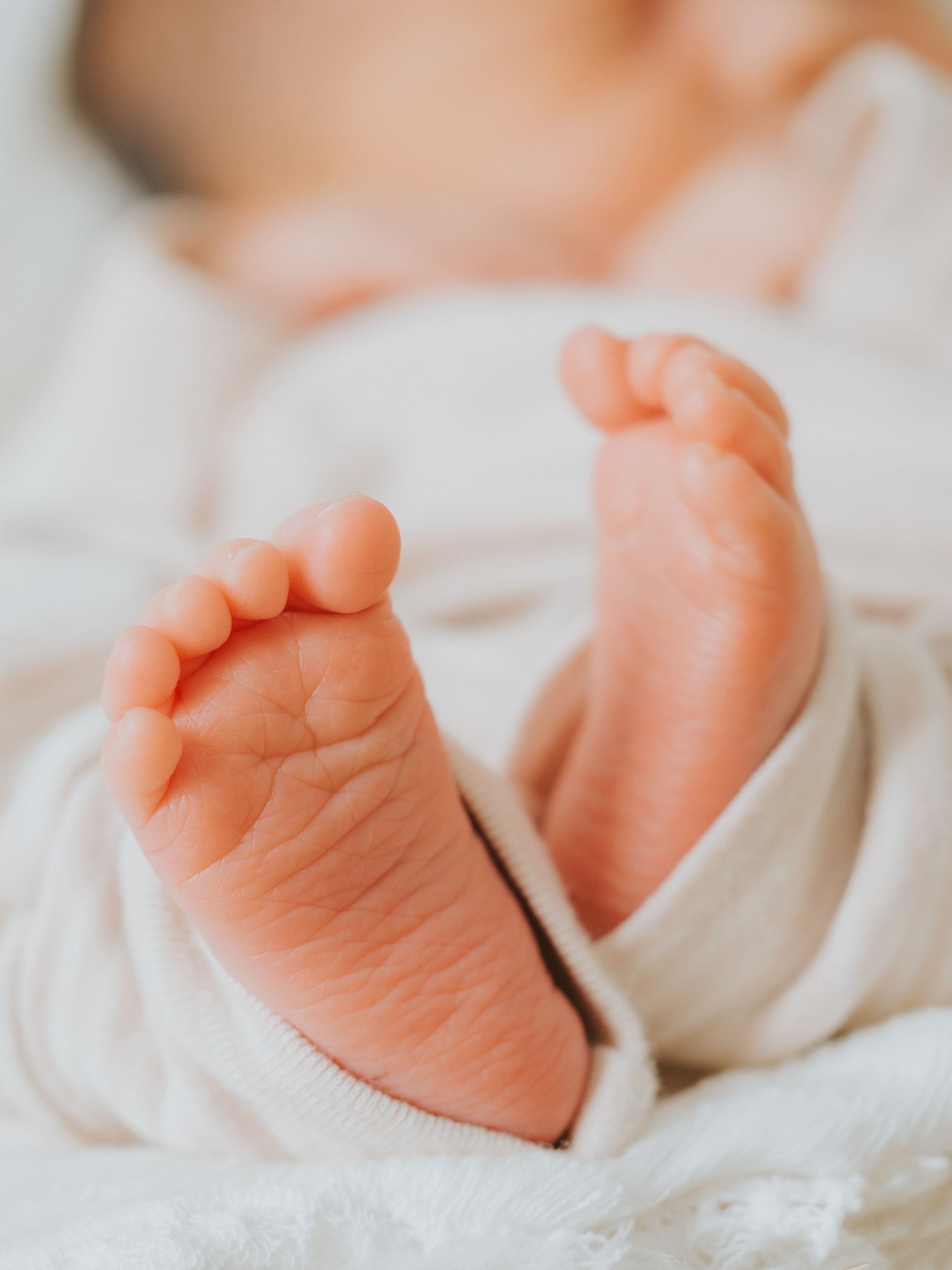 Feet of newborn.