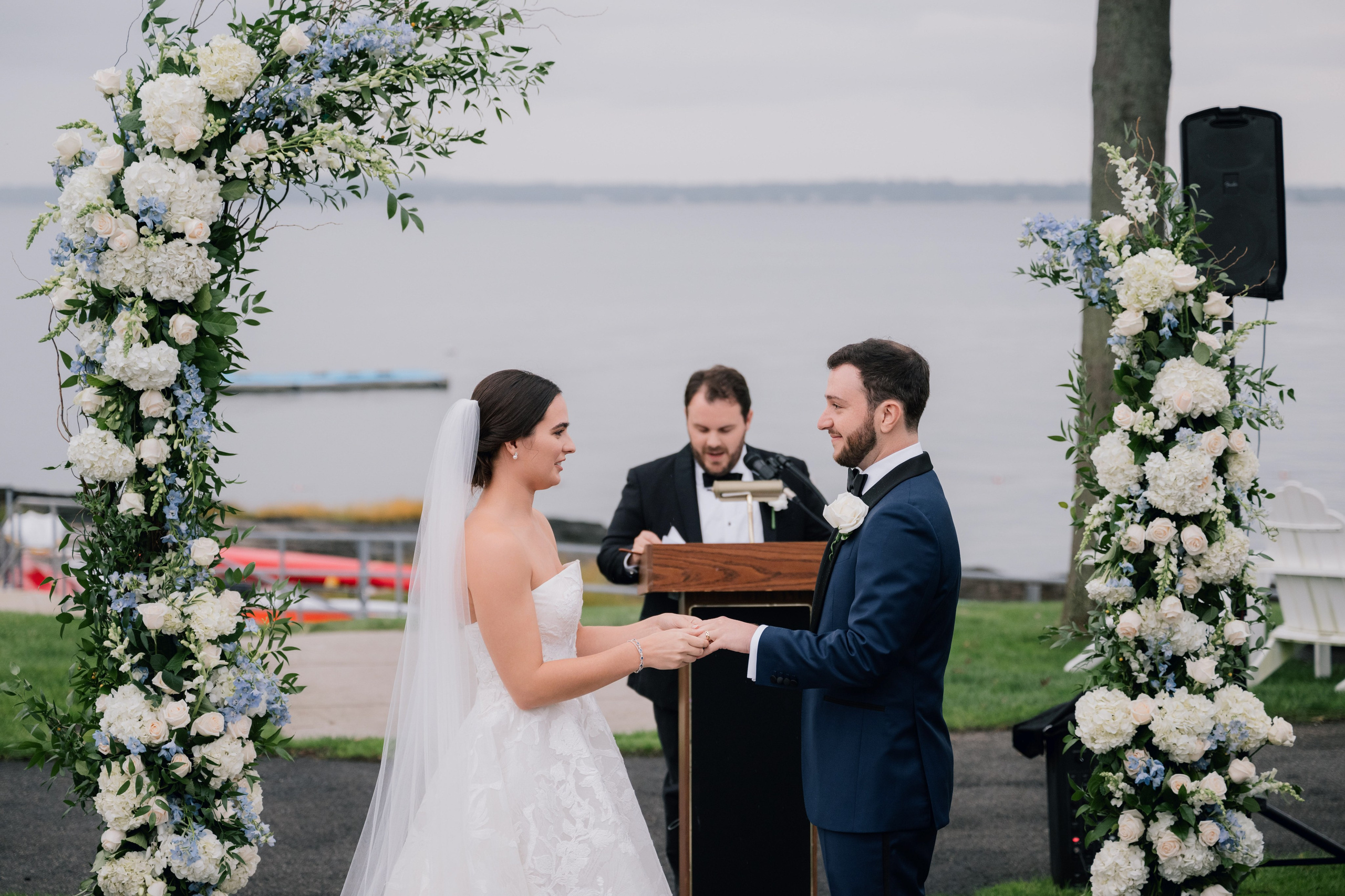 a bride and groom exchanging during their wedding ceremony