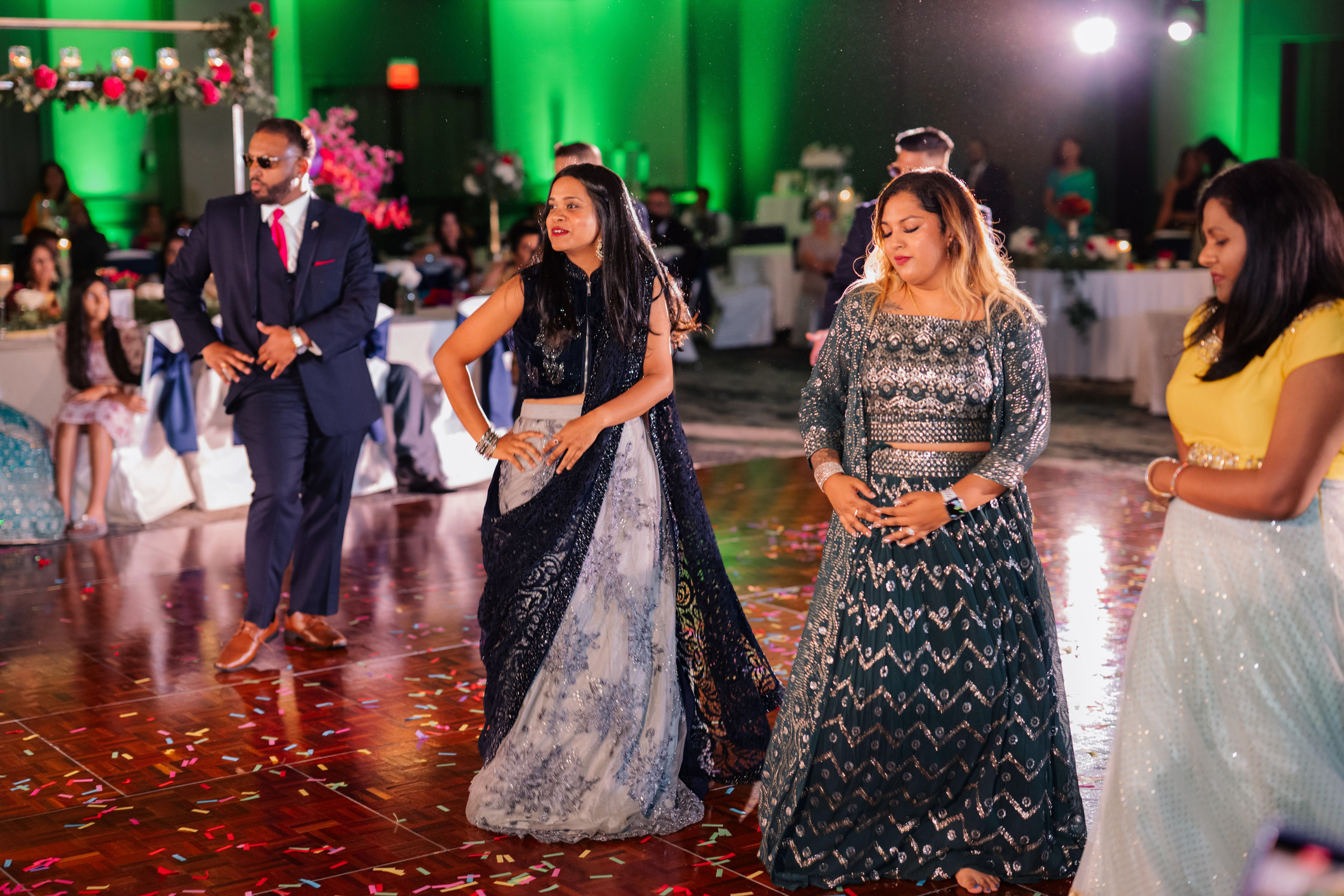 a group of people dancing on a dance floor