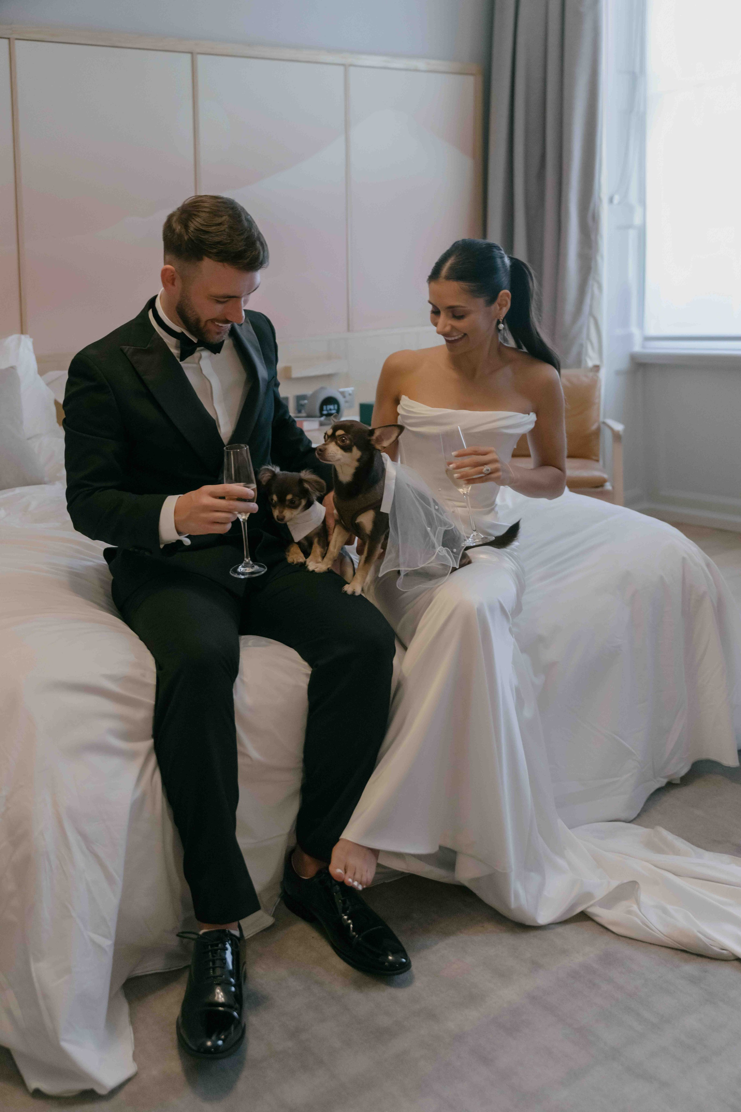 intimate wedding with dogs London hotel celebration bride and groom candid emotional moment UK
