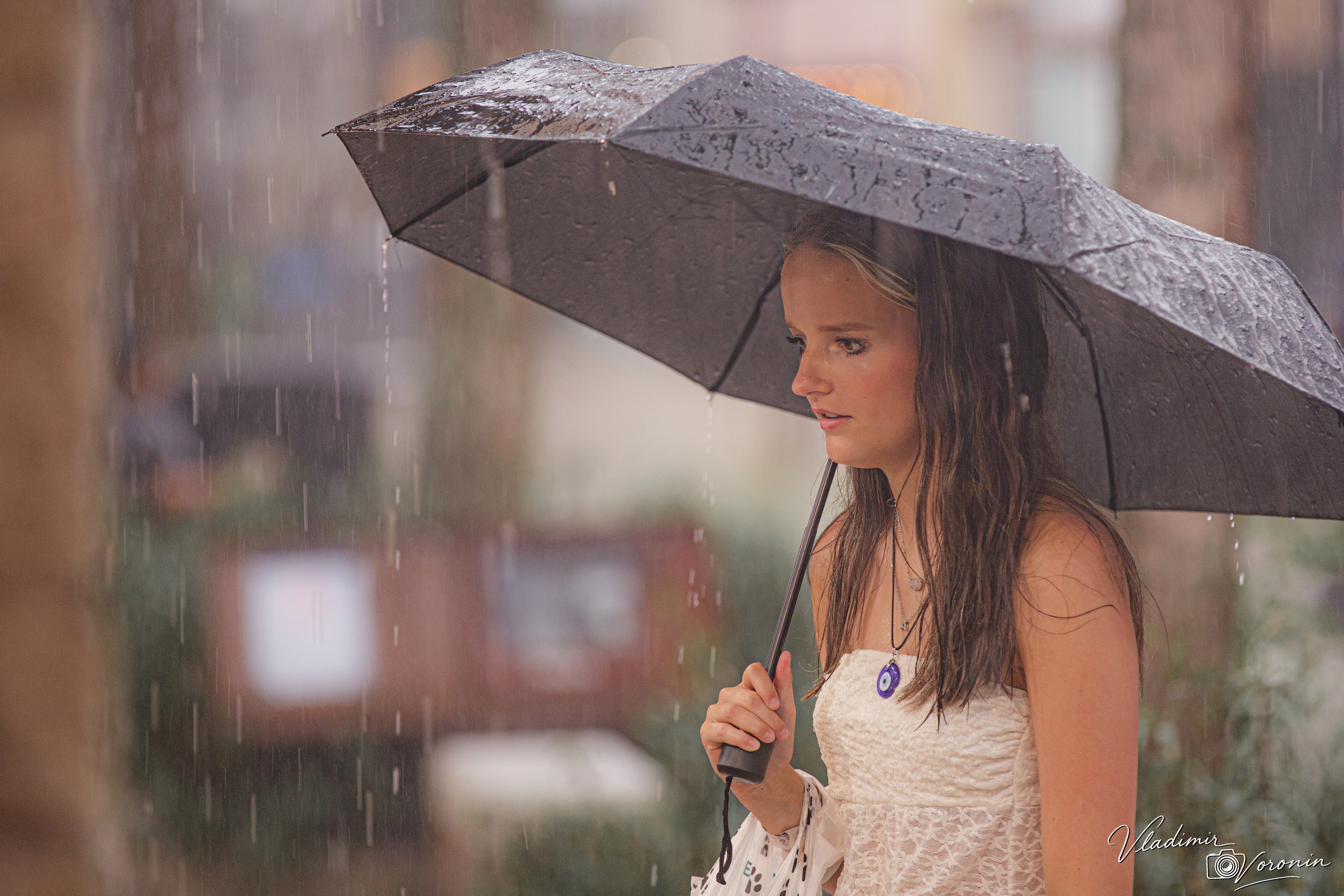 Rain in downtown. Photographer St. Augustine