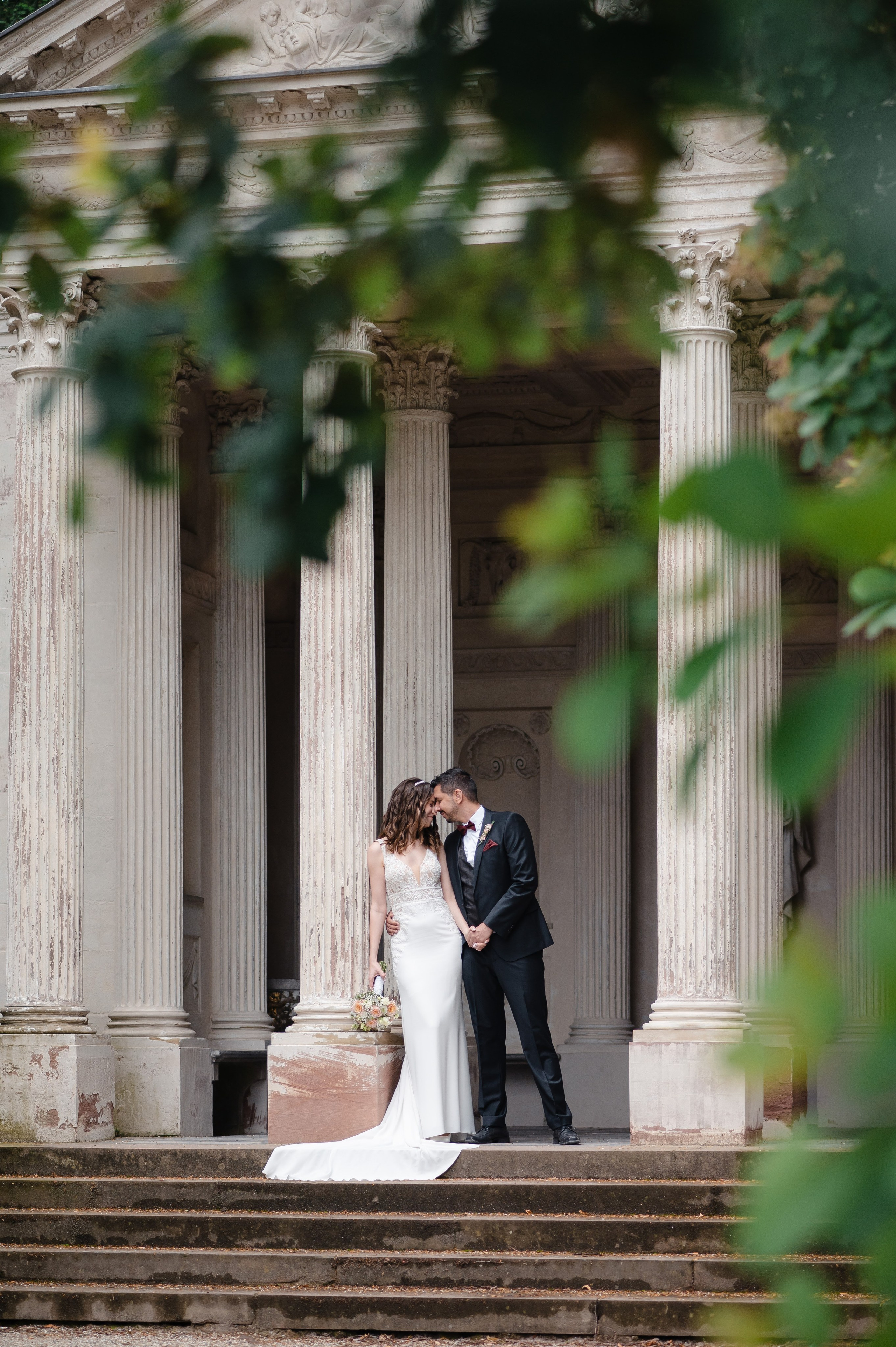 Hochzeitsfotografie am Brunnen im Schlosspark Schwetzingen