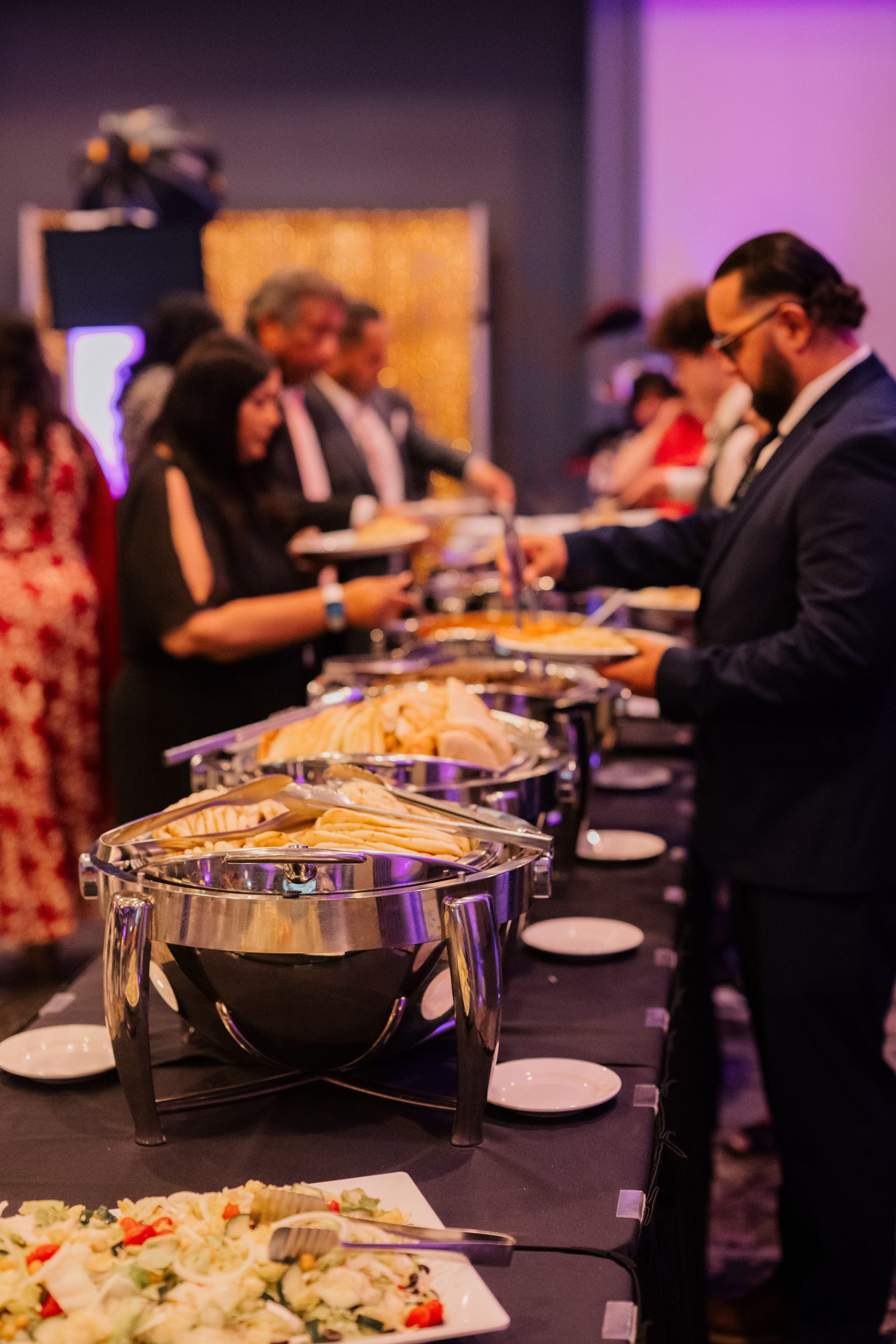 a buffet of food is served on a table