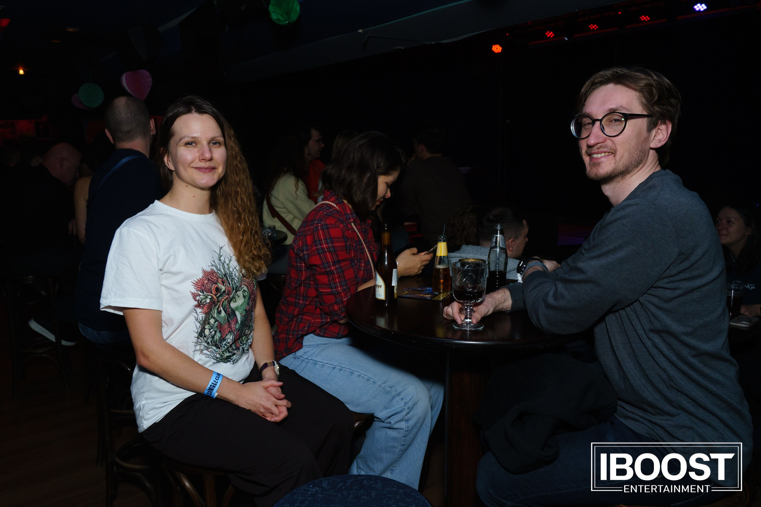 Woman and man sitting together at a table during the Animal JazZ concert in Sofia.