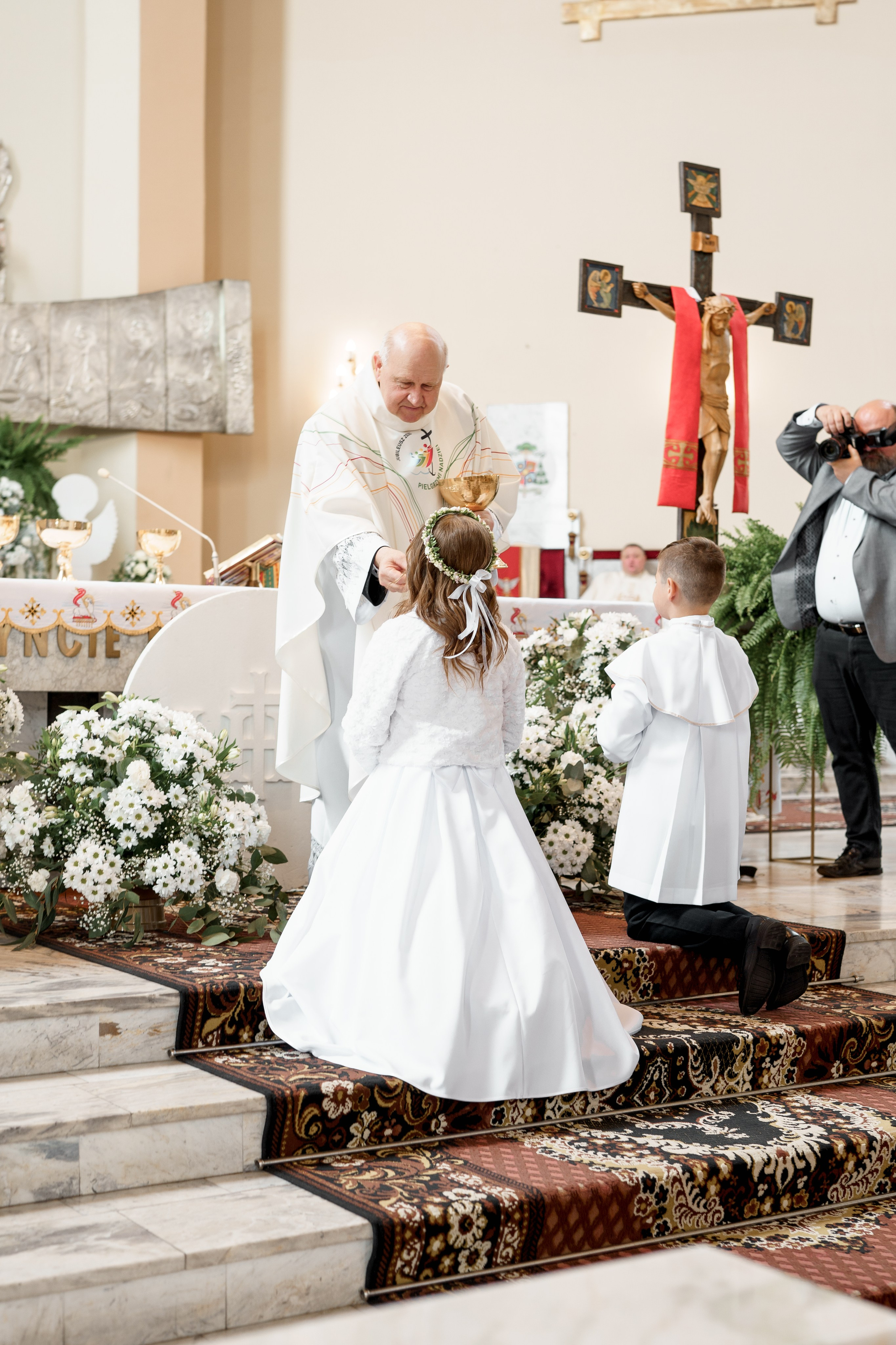 Reportaż z okazji Chrztu Świętego w Łodzi. Fotograf Łódź - sesja ciążowa, noworodkowa, dziecięca. Studio w Łodzi