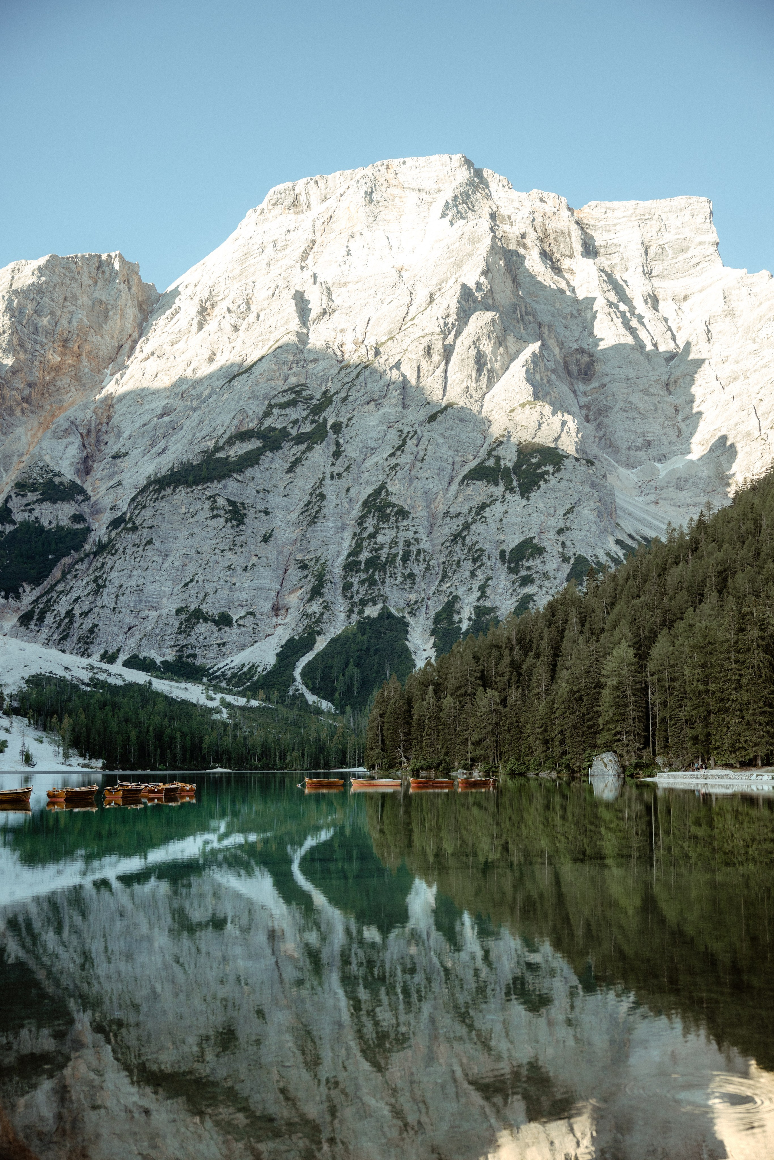 Sunrise proposal at Lago di Braies | Dreamy engagement in the Dolomites. Iceland elopement photographer & videographer