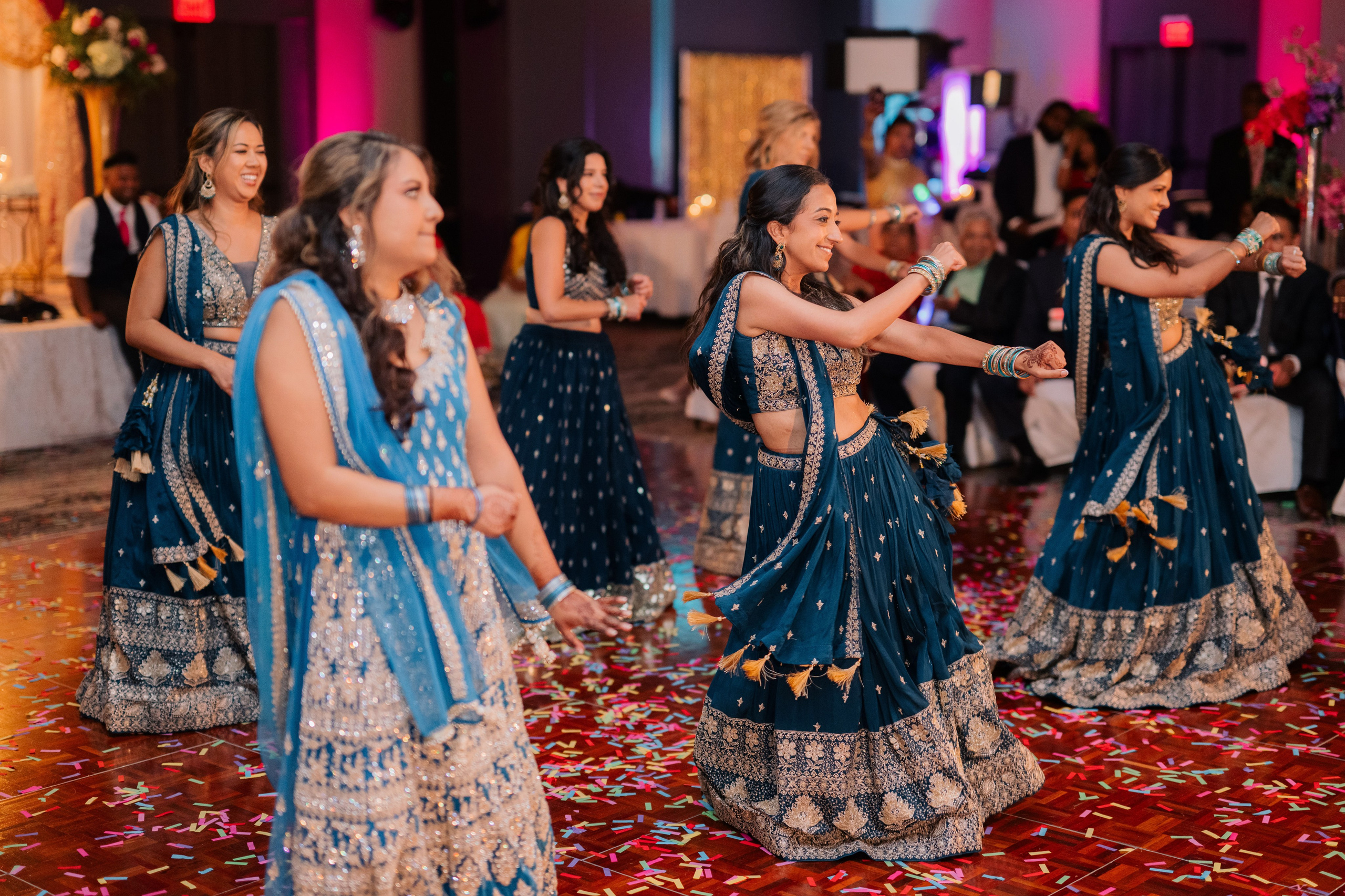 a group of women dancing on a dance floor