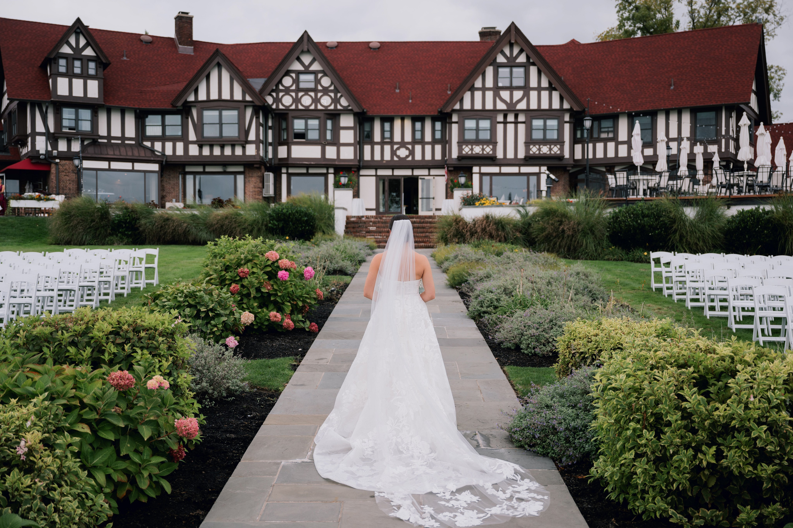 a bride walking down the aisle of a wedding ceremony
