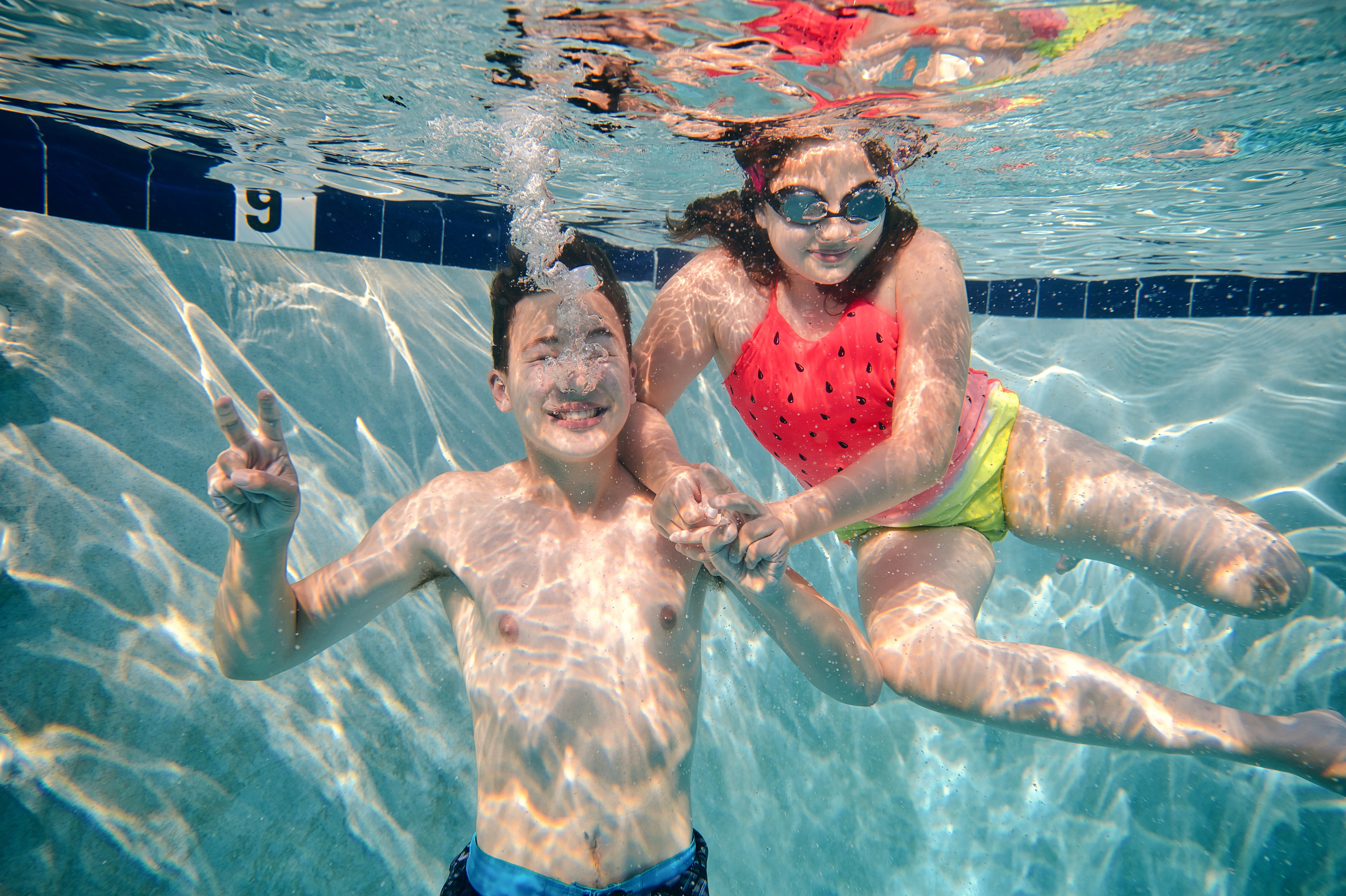 Olga’s Family Underwater Shoot. Family and Sports photographer in Cary Raleigh NC North Carolina