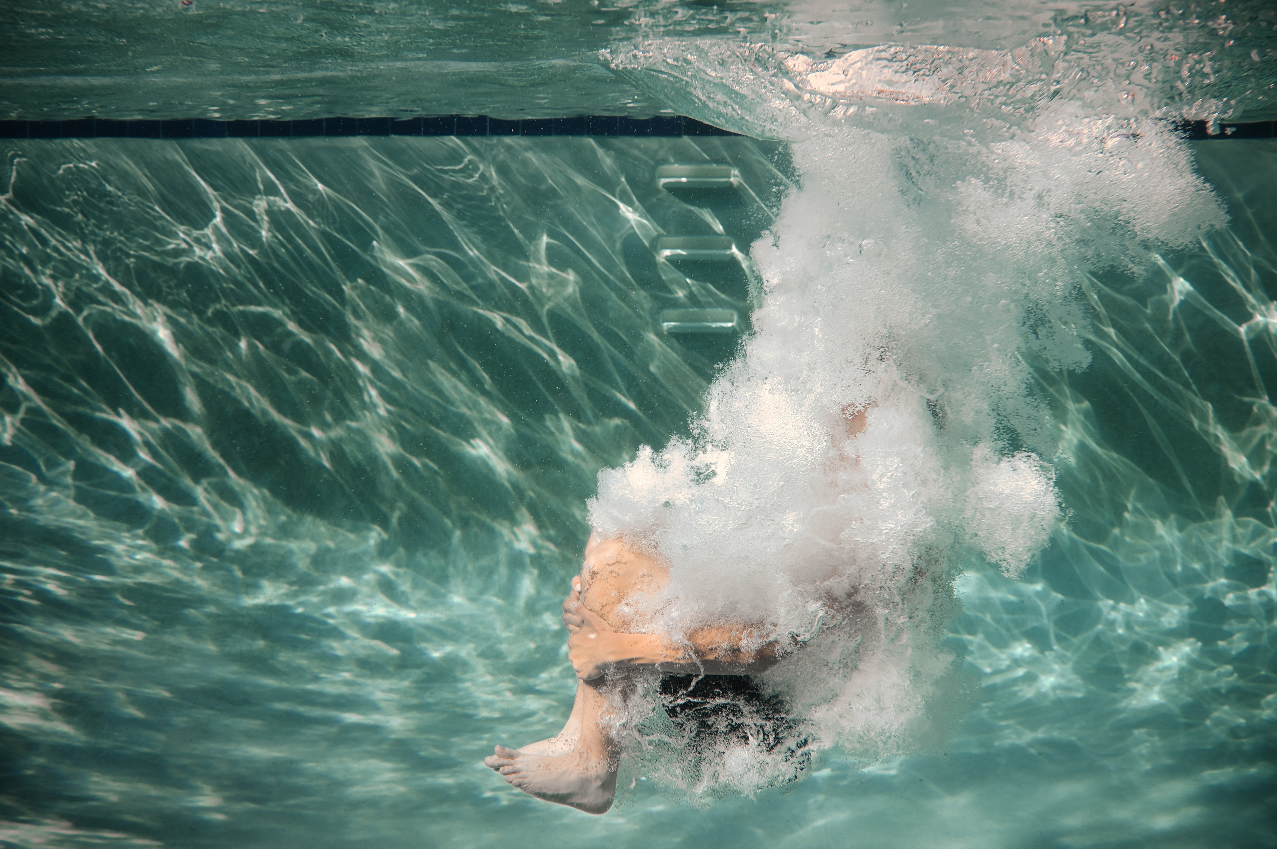 Olga’s Family Underwater Shoot. Family and Sports photographer in Cary Raleigh NC North Carolina