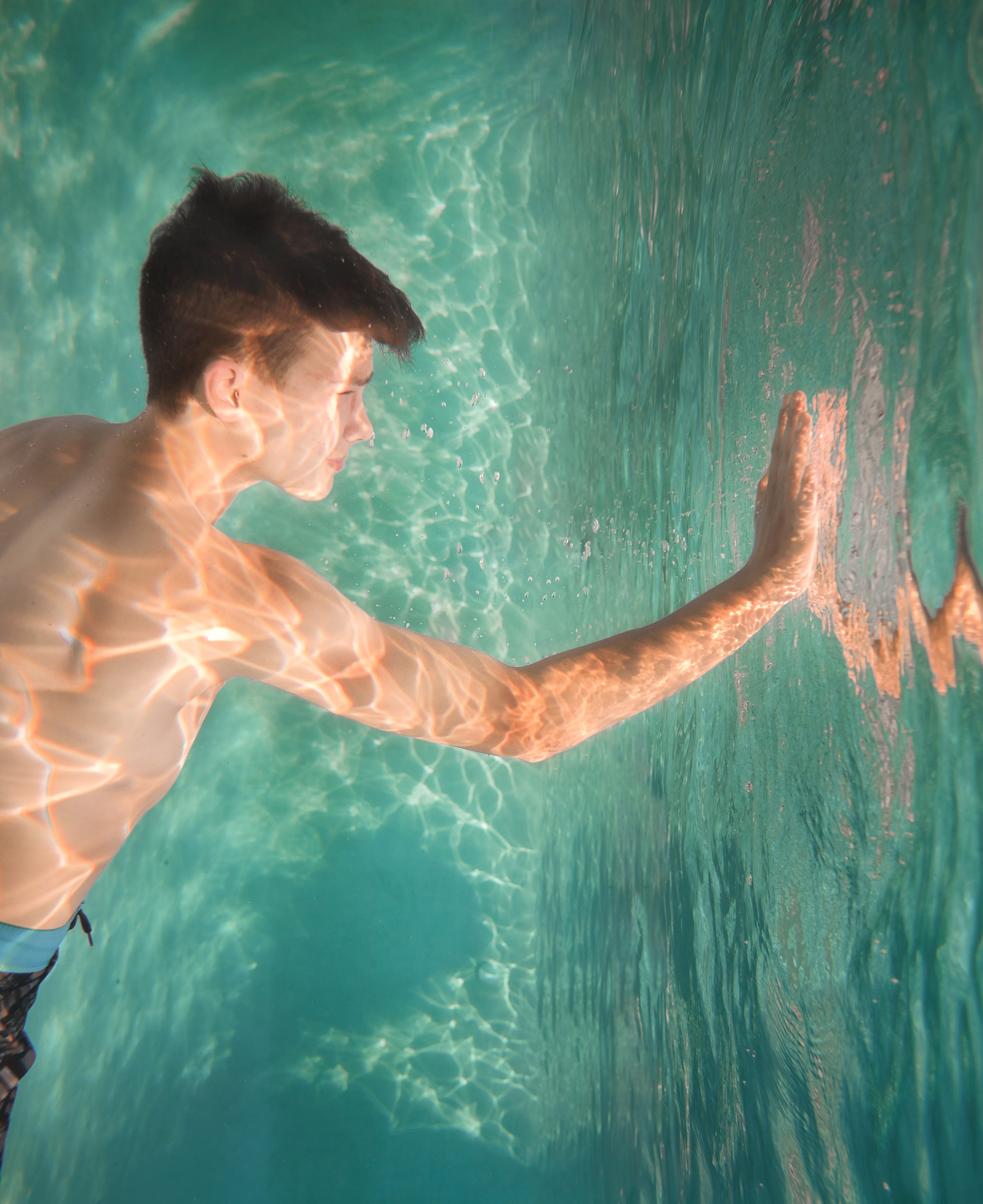 Olga’s Family Underwater Shoot. Family and Sports photographer in Cary Raleigh NC North Carolina