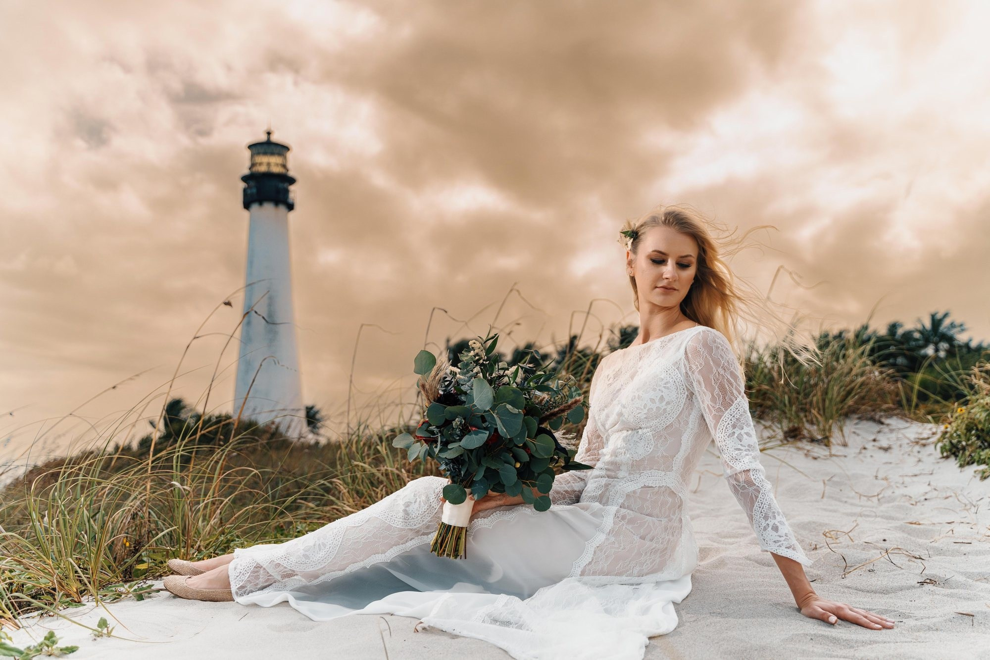 Key Biscayne beach wedding photography — bride on sand dunes by the lighthouse