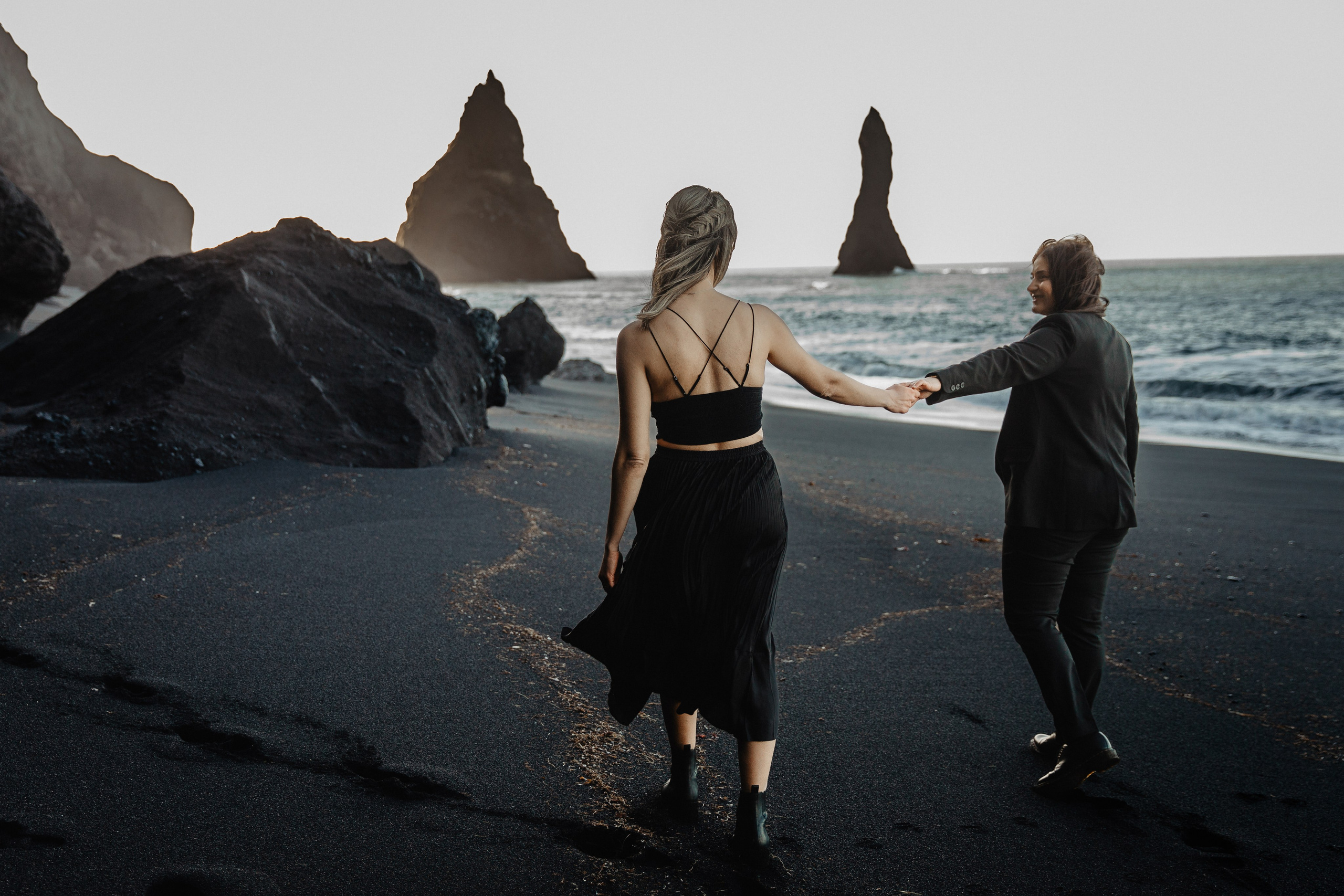 Same Sex Wedding at Iceland Black Sand Beach. Iceland elopement photographer & videographer