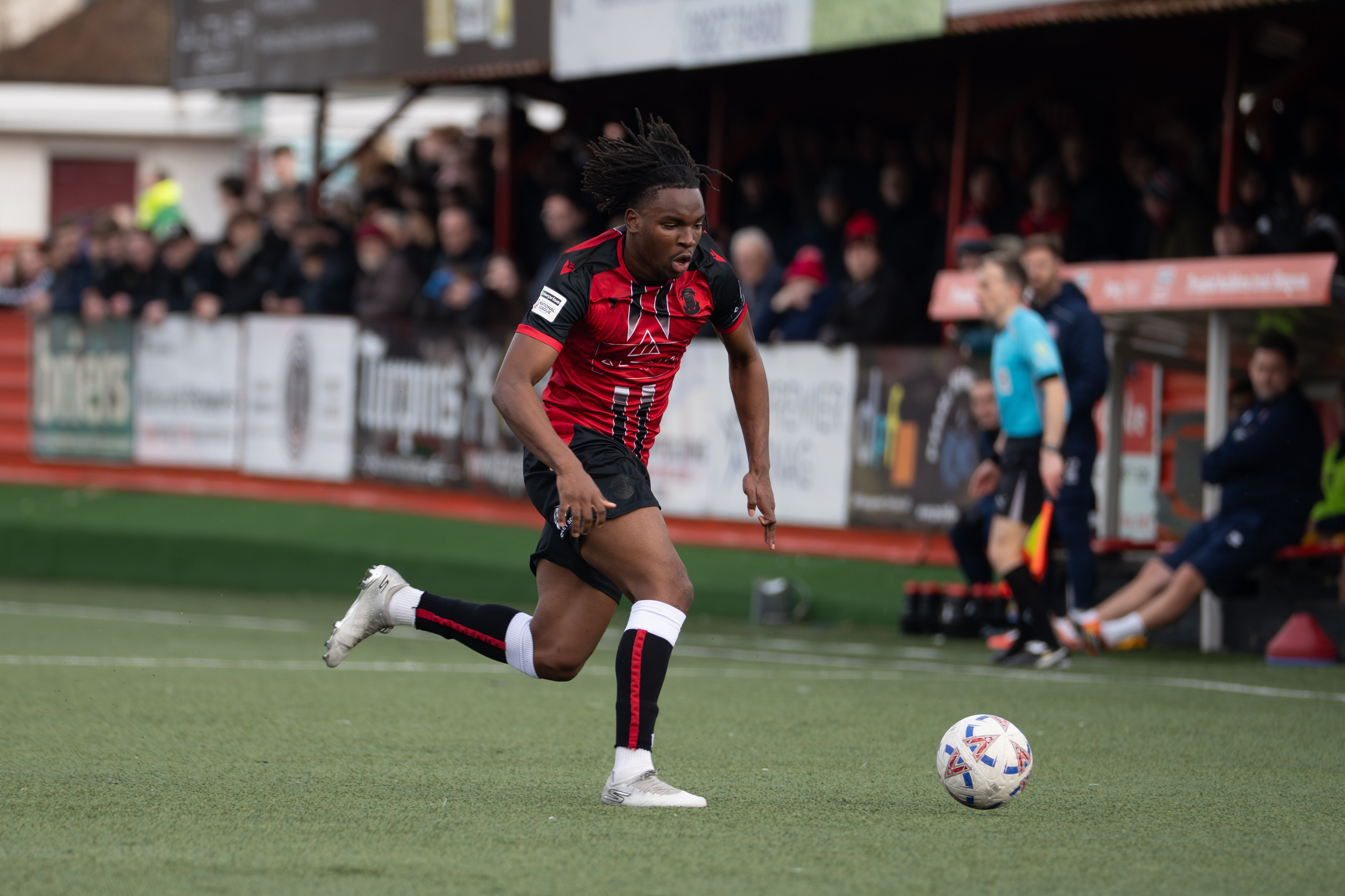 Tamworth, England — February 14, 2026: A Tamworth FC player Daniel Isichei in possession during the Enterprise National League match between Tamworth FC and Aldershot Town at The Lamb Ground. Photo: Jay Soundo