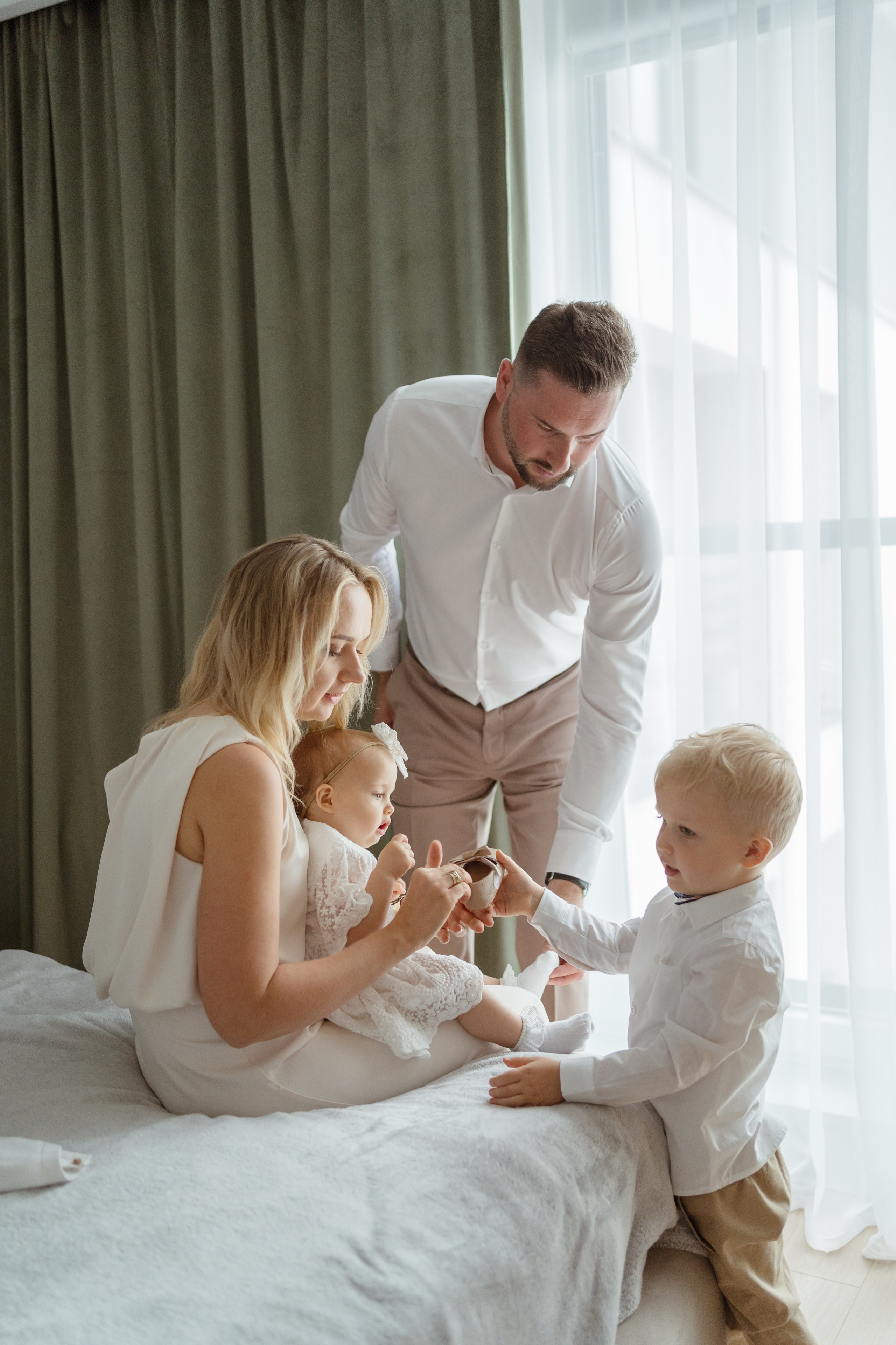 Reportaż z okazji Chrztu Świętego w Łodzi. Fotograf Łódź - sesja ciążowa, noworodkowa, dziecięca. Studio w Łodzi