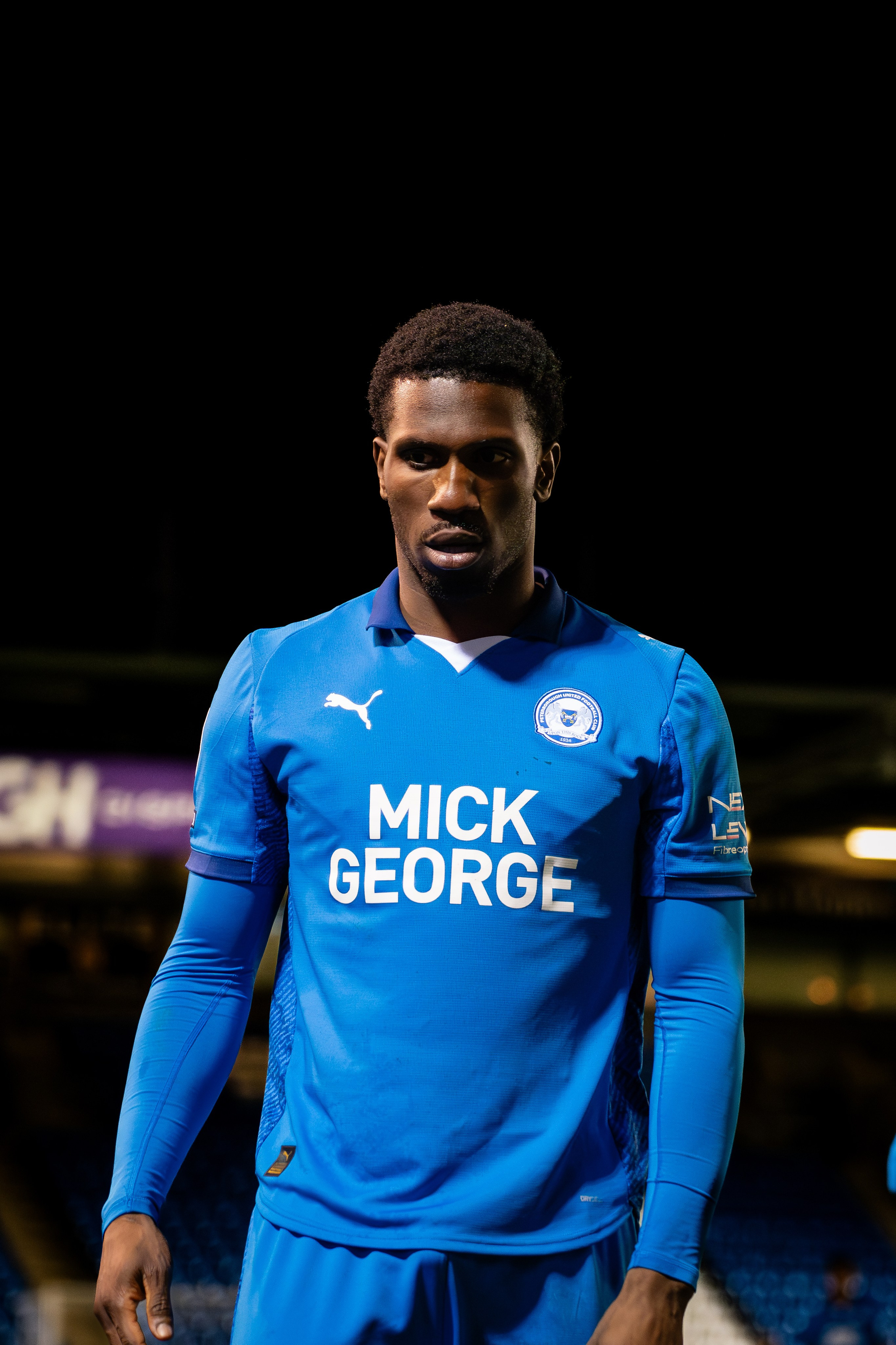 Peterborough United player photographed during the League One match against Mansfield Town at the Weston Homes Stadium