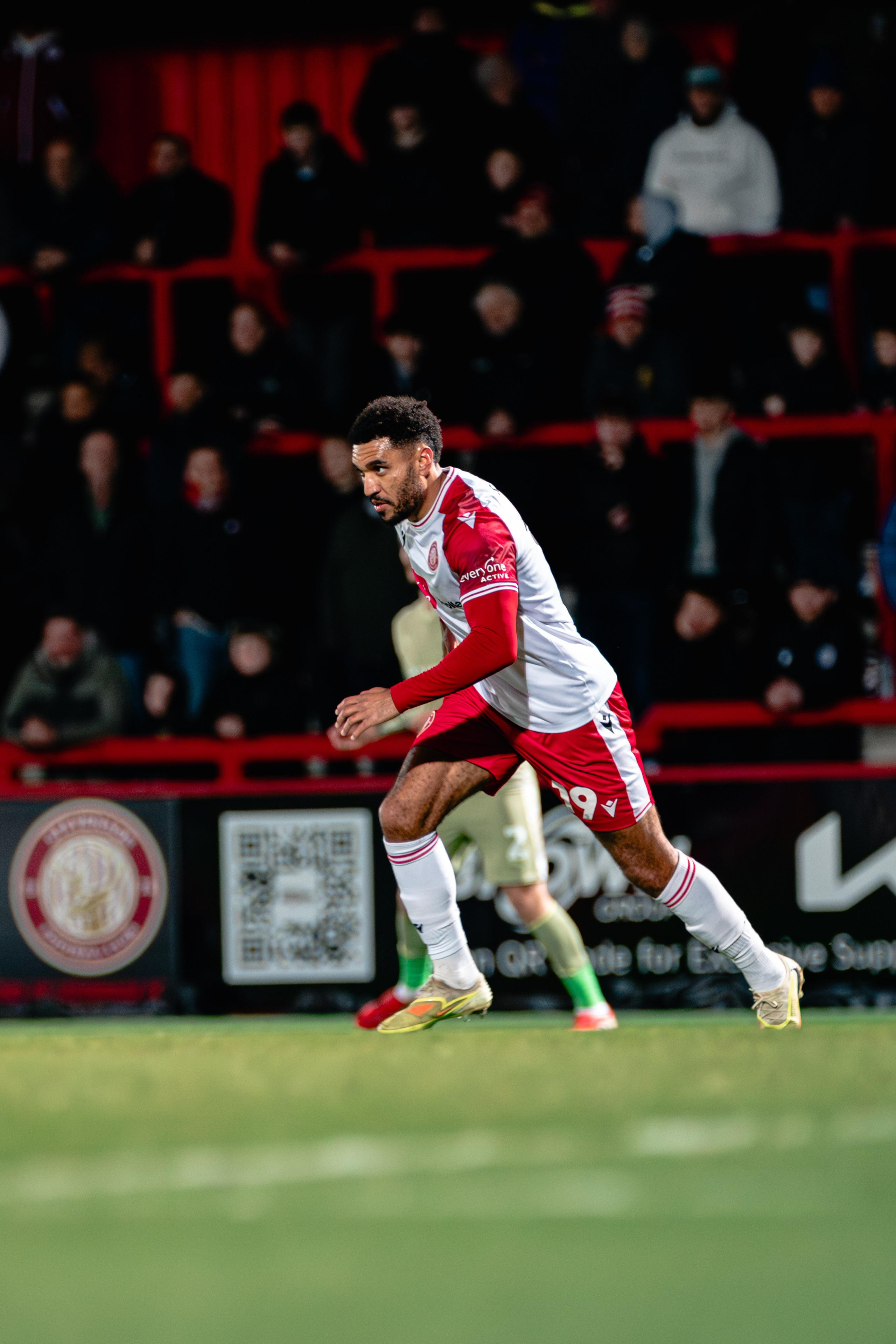 Stevenage player running with the ball during the League One match against Leyton Orient at the Lamex Stadium