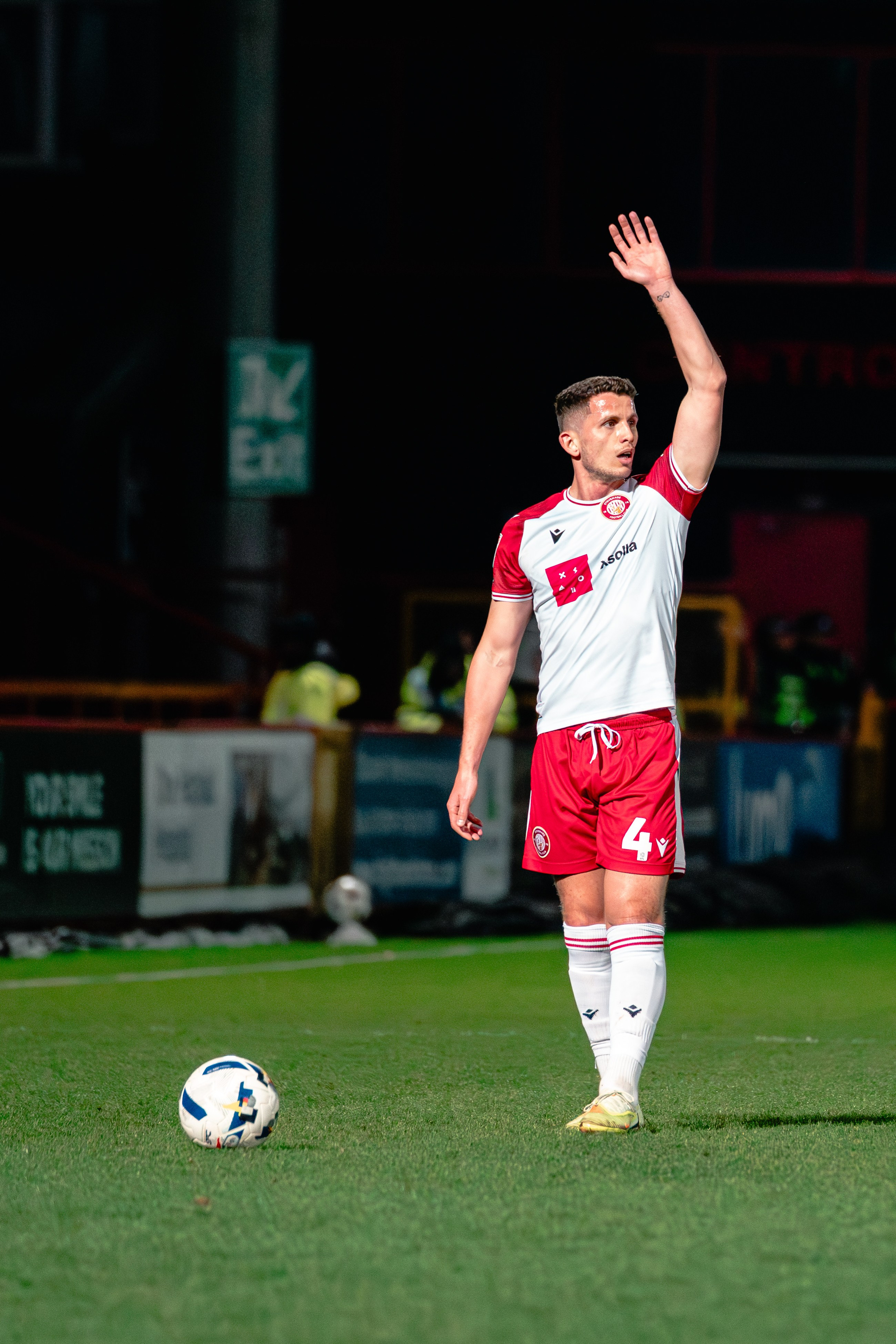 Stevenage player raising his hand during the League One match against Leyton Orient at the Lamex Stadium.