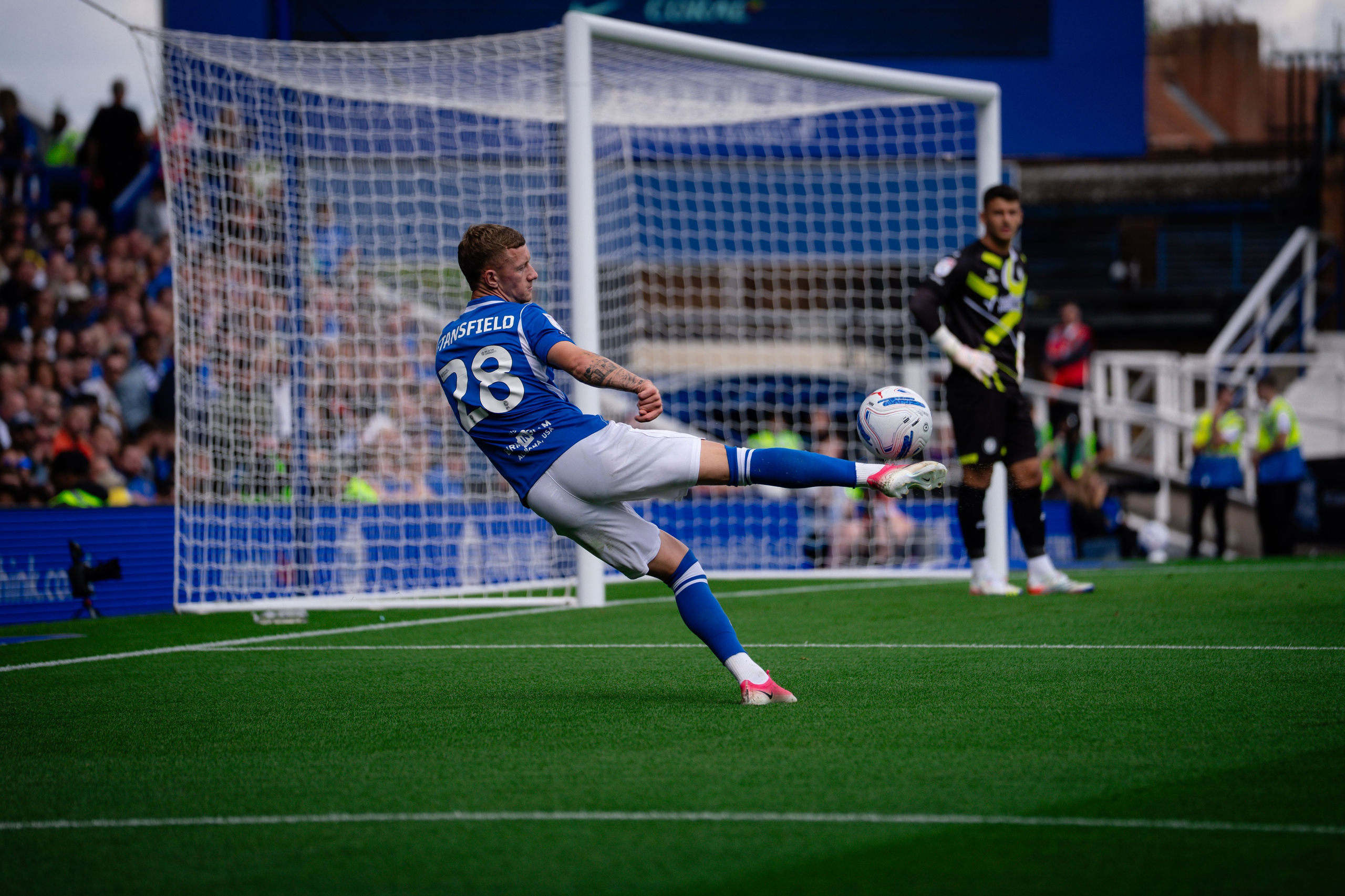 Birmingham City player shooting towards goal during the Championship match against Bristol City.