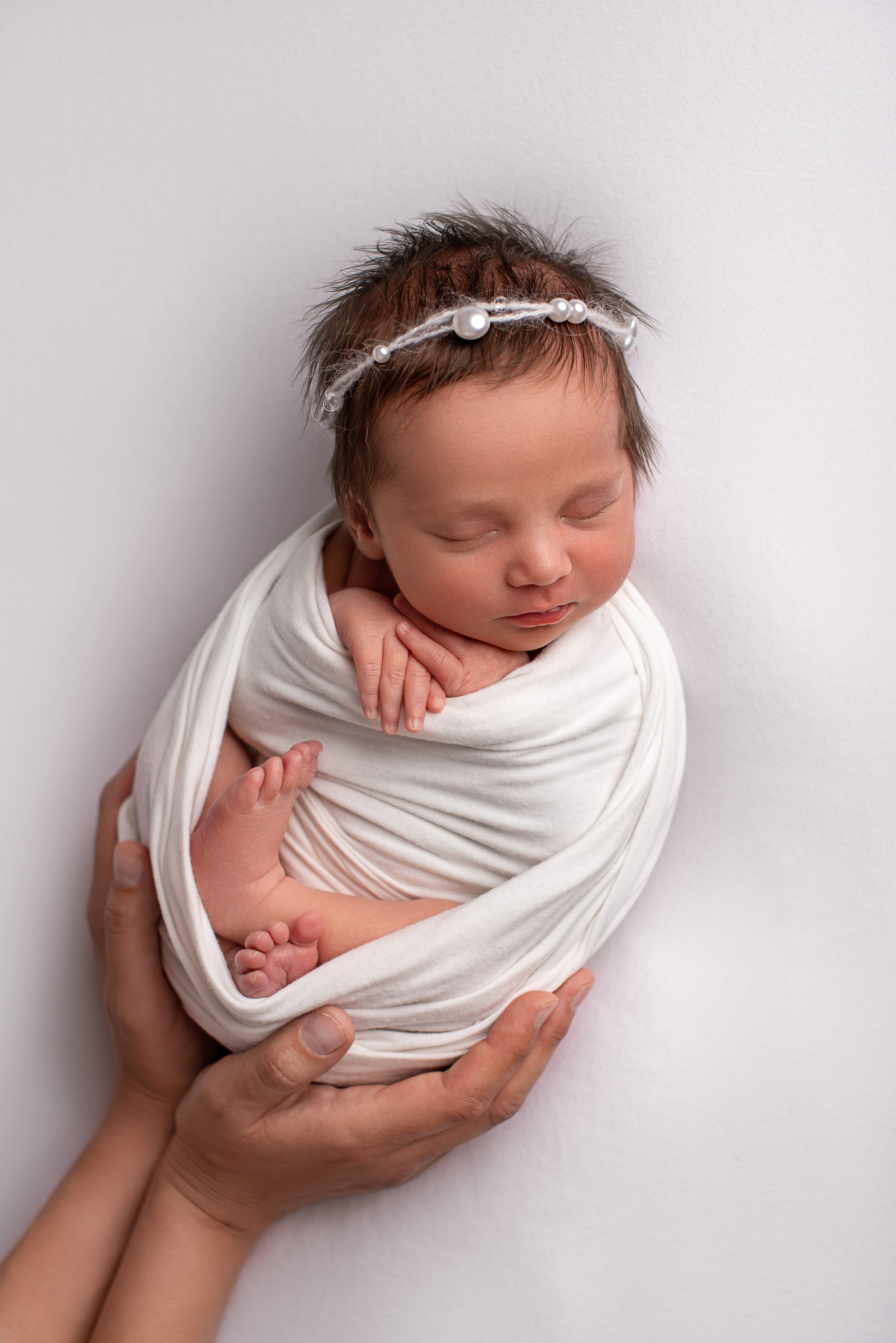 Neugeborenenfotos in Berlin – Studio oder bei Ihnen zu Hause