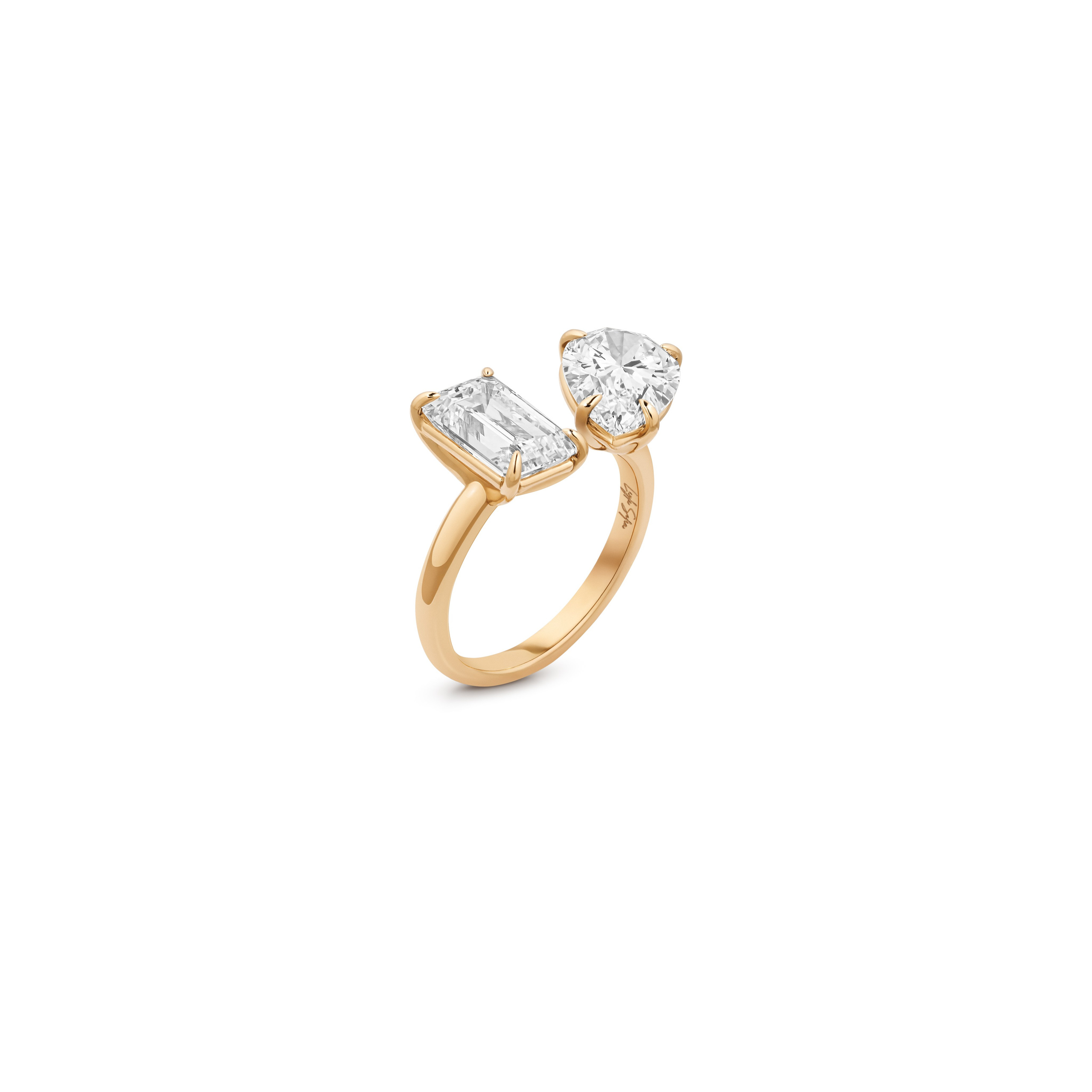 Two-stone engagement ring in yellow gold, emerald and pear cut diamonds