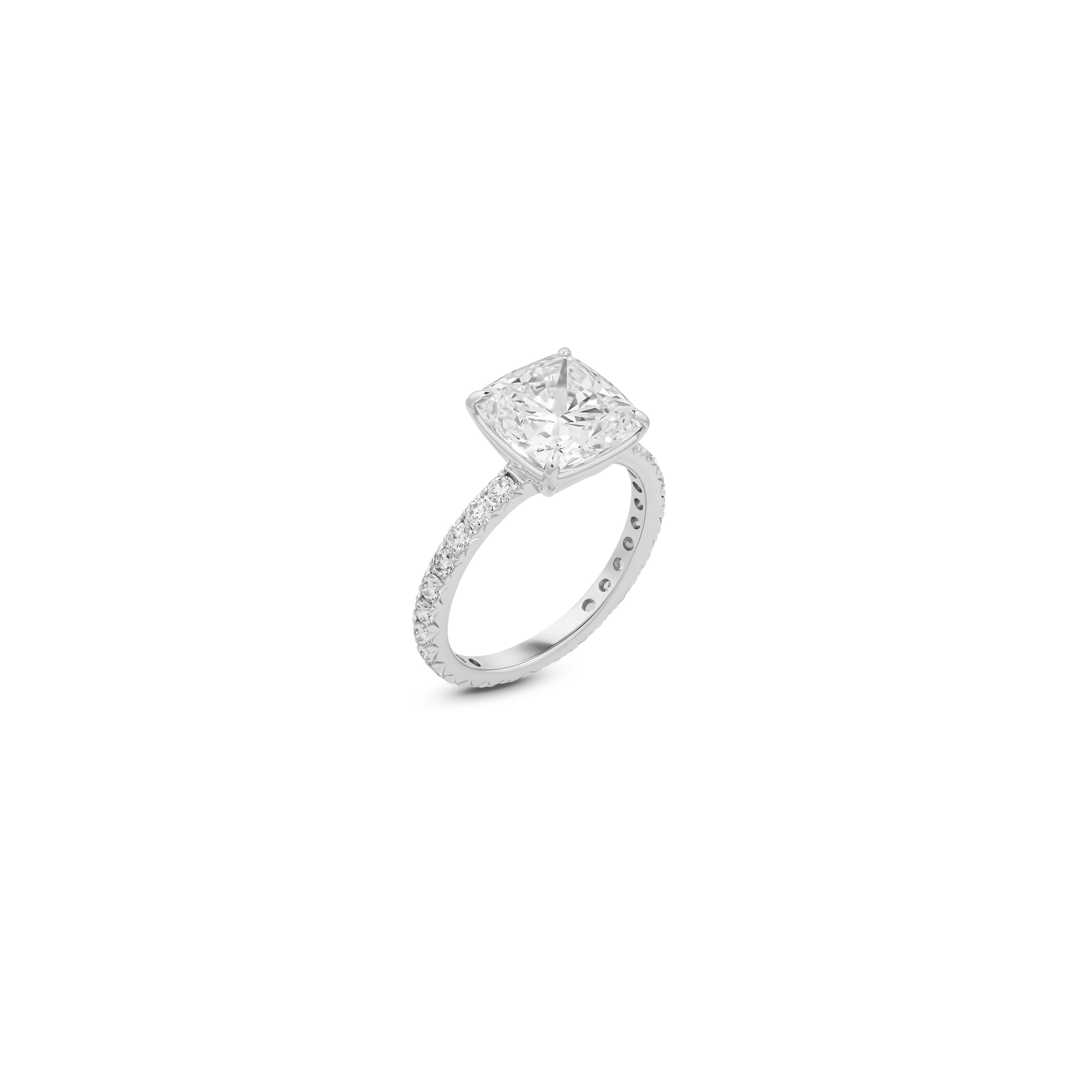 White gold engagement ring with pavé band, cushion cut centre stone