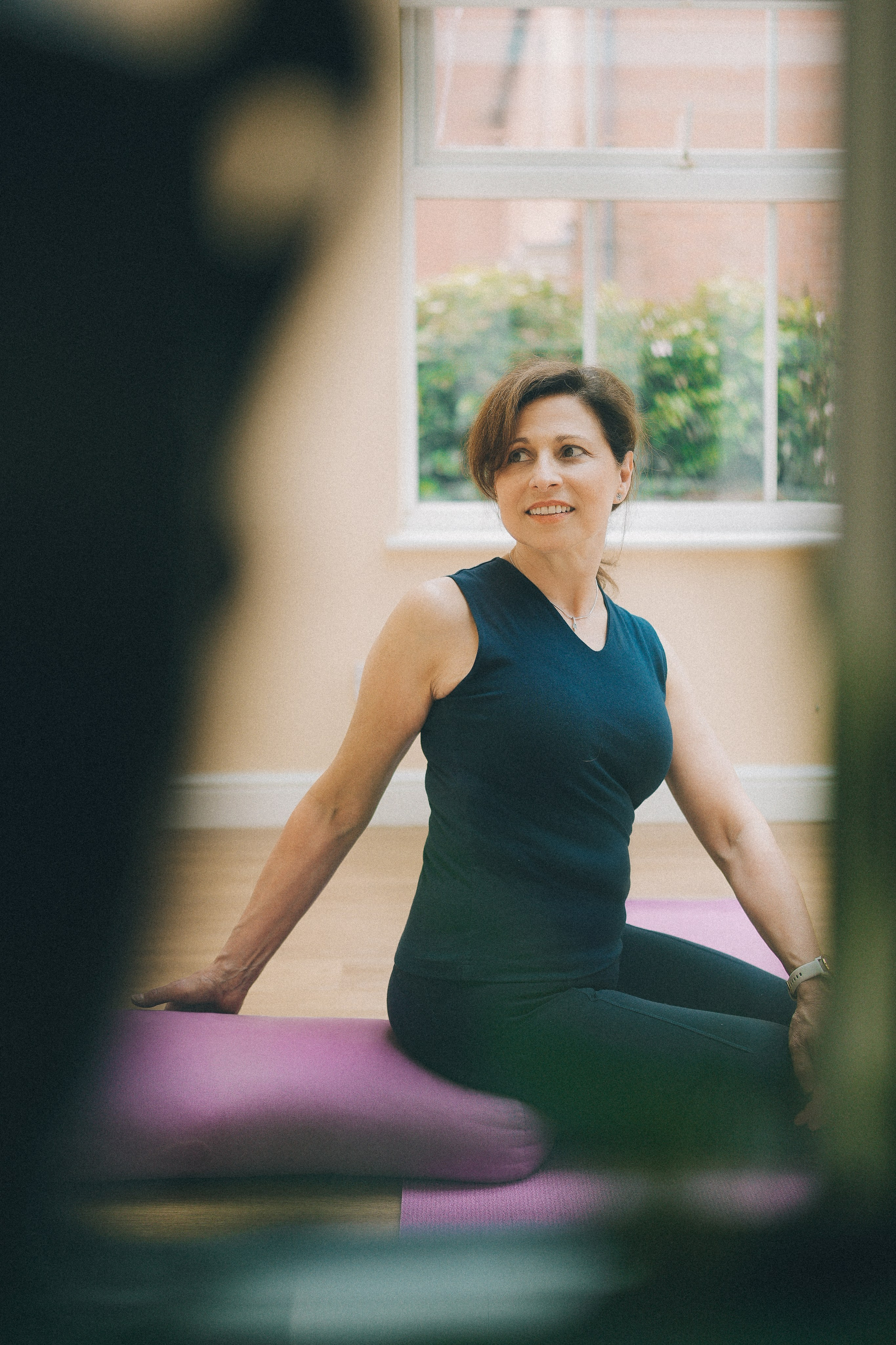 Pilar at Solihull Iyengar Yoga studio. Brand storytelling photography.