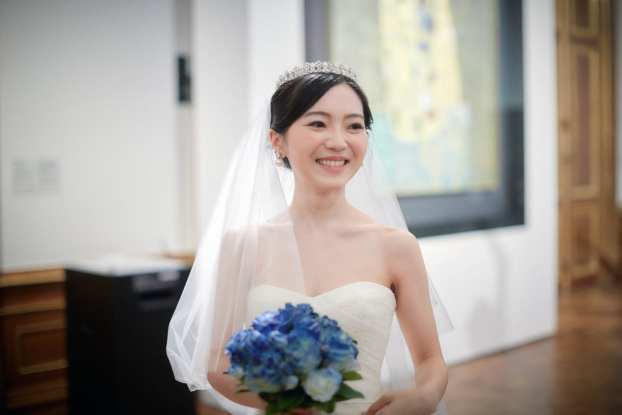The radiant Hitomi seconds before she is to walk into the ceremonial hall to marry her sweetheart, Katsuya.