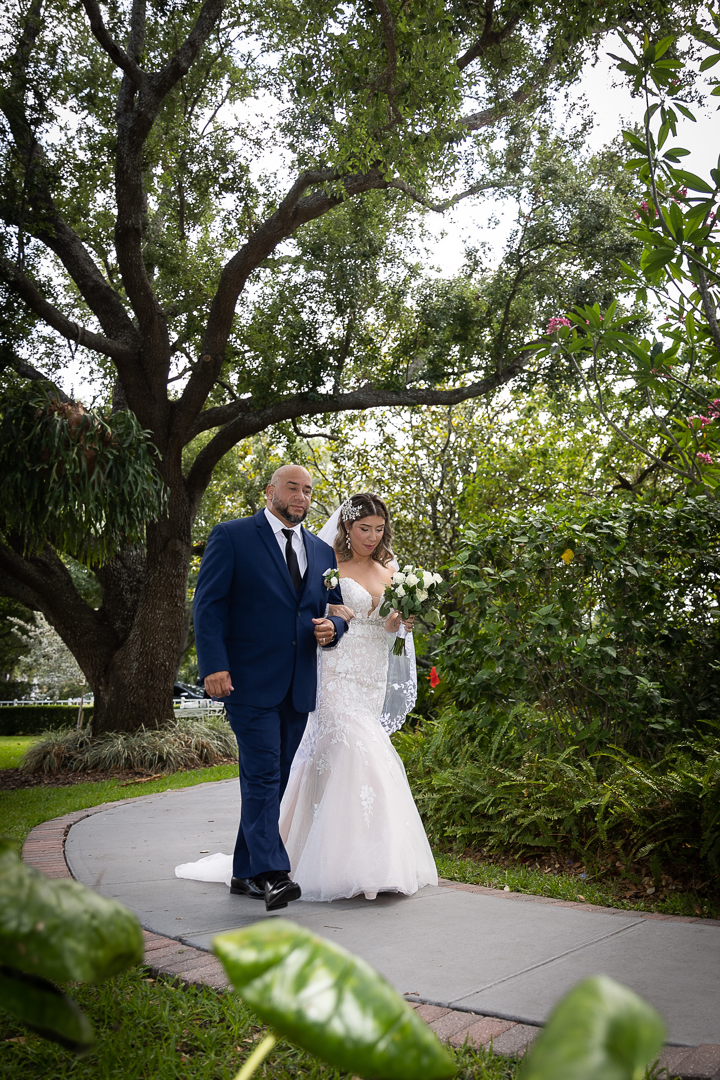 Walking down the isle at Wedding at Davis Island Garden Club, Tampa, FL