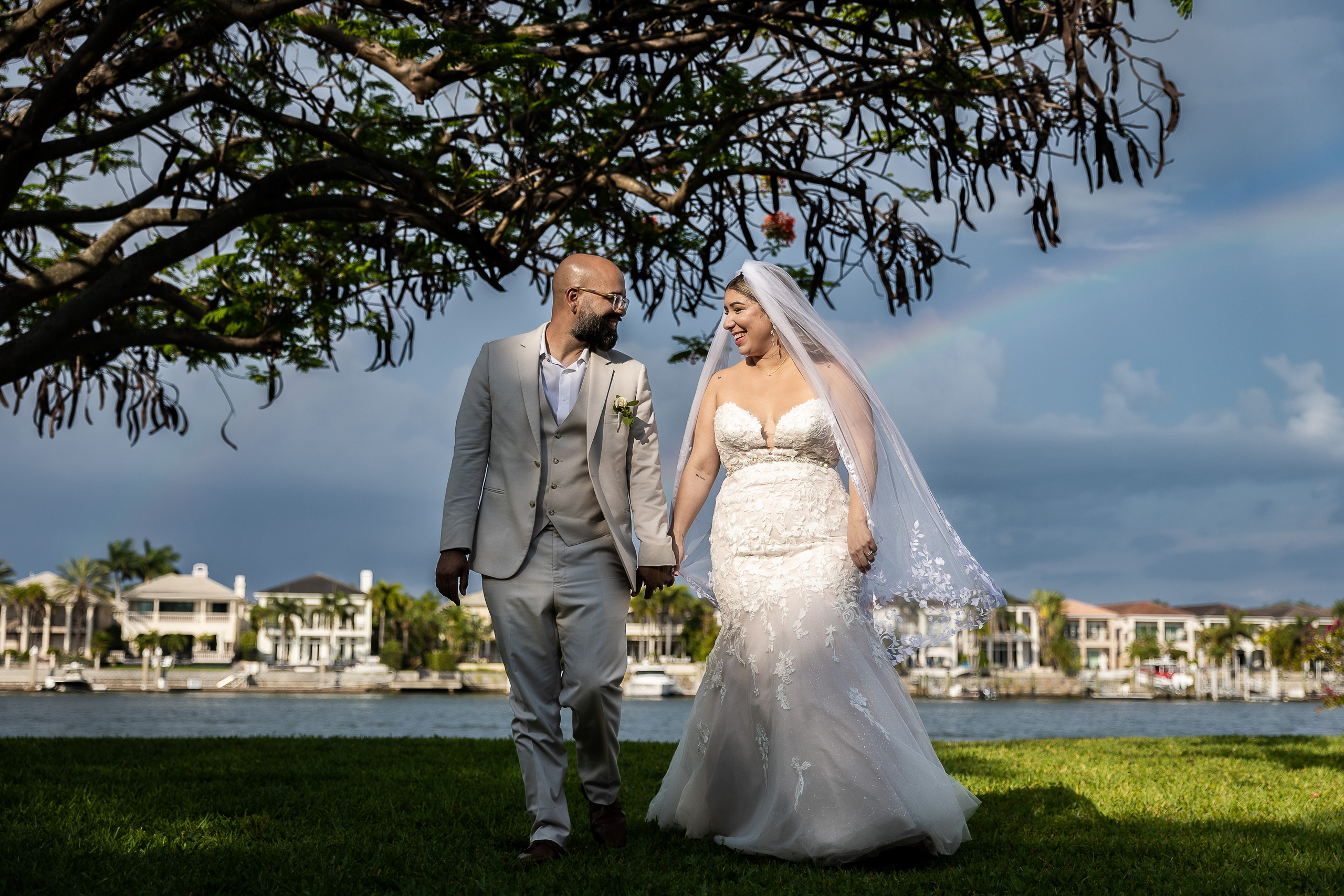 Bride and Groom under the rainbow in Davis Island Garden Club, Tampa, FL