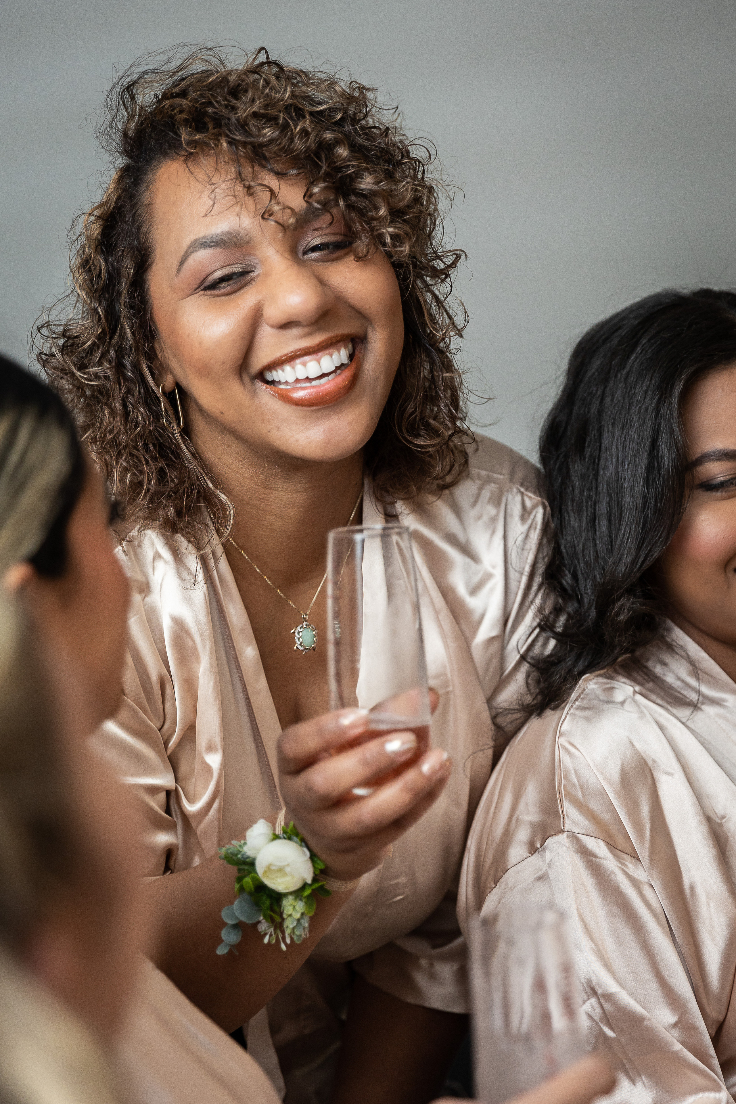 Bridesmaids and champagne bride morning