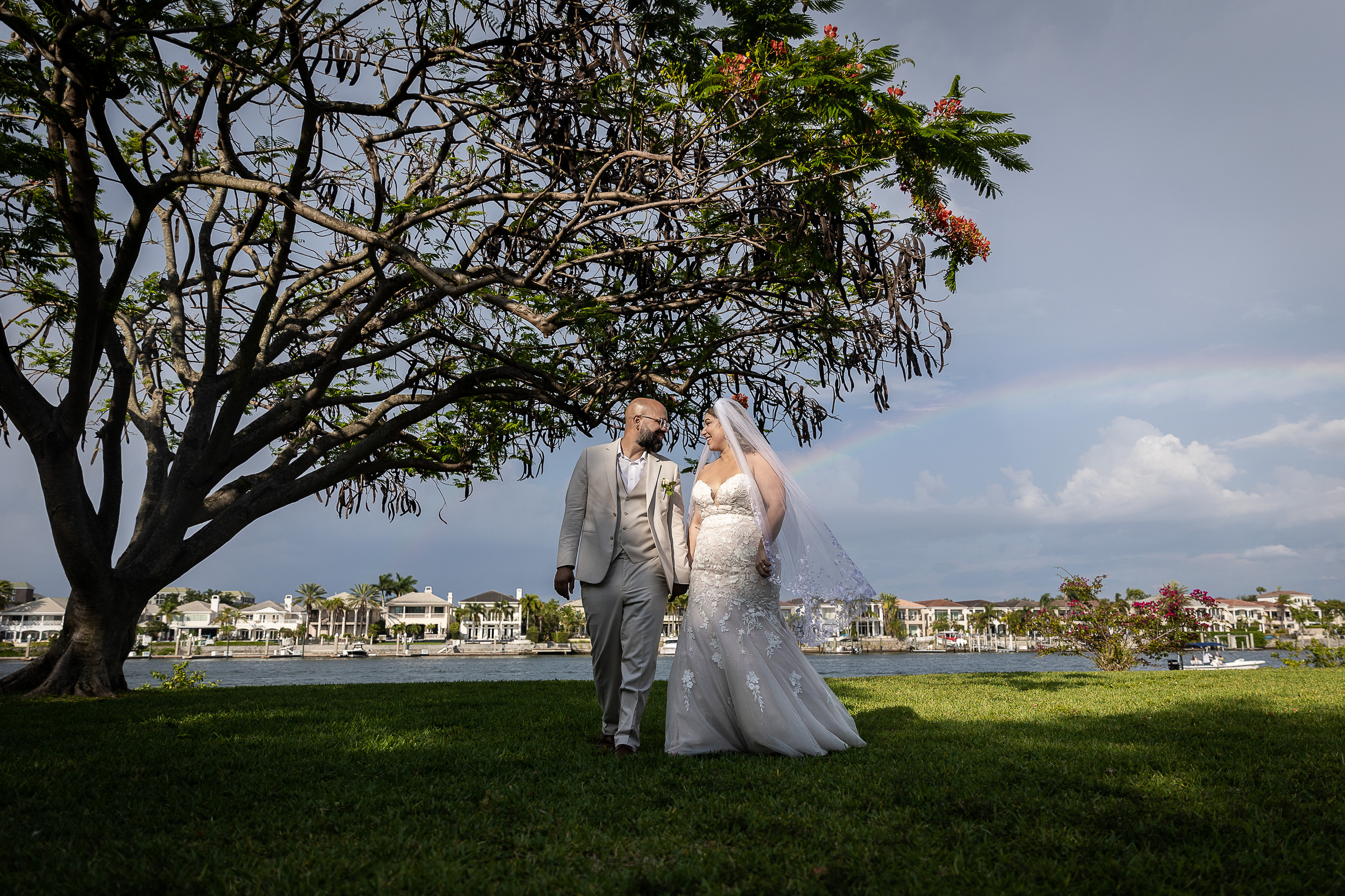 Bride and Groom under the rainbow in Davis Island Garden Club, Tampa, FL