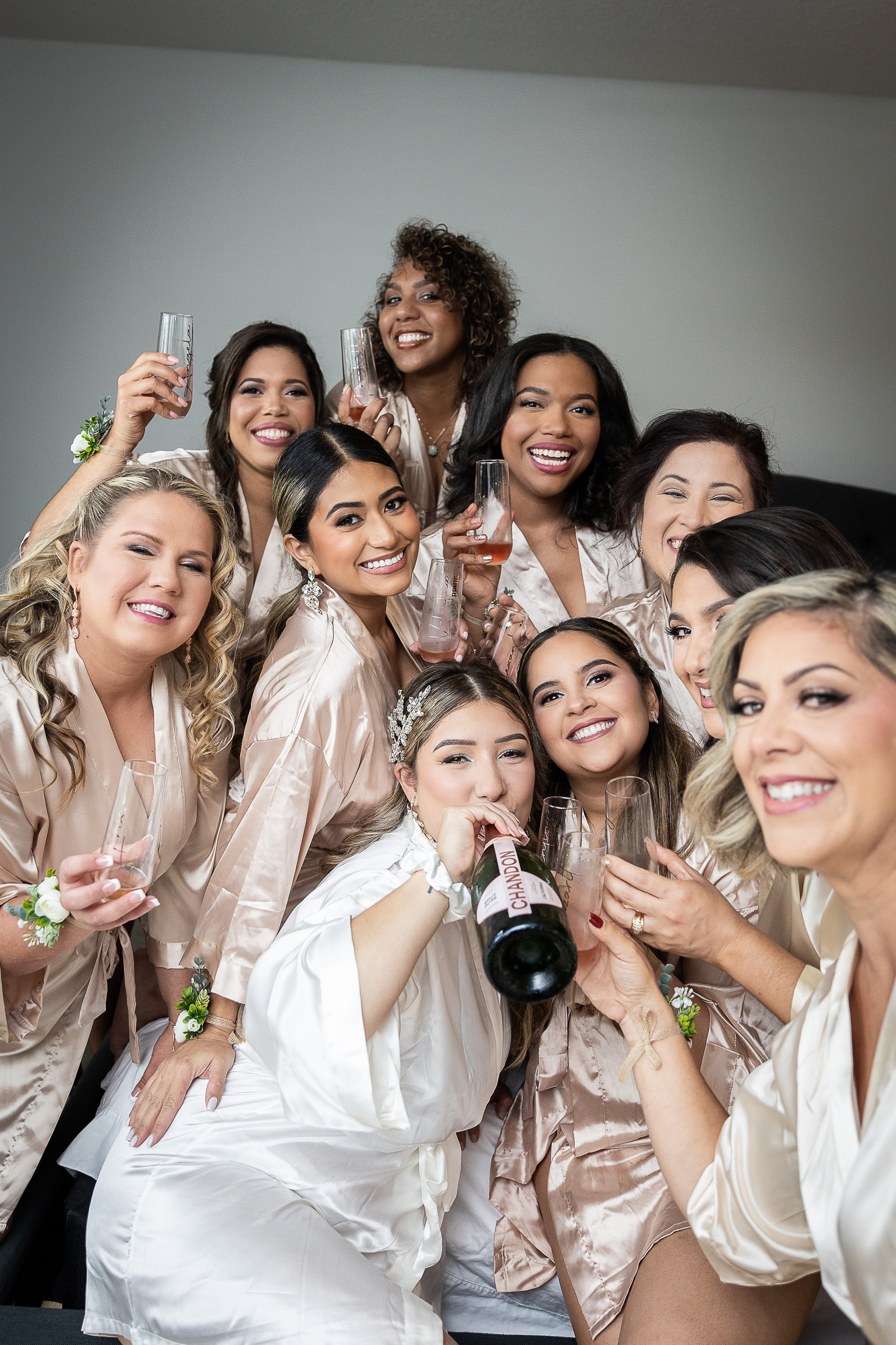 Bridesmaids and champagne bride morning
