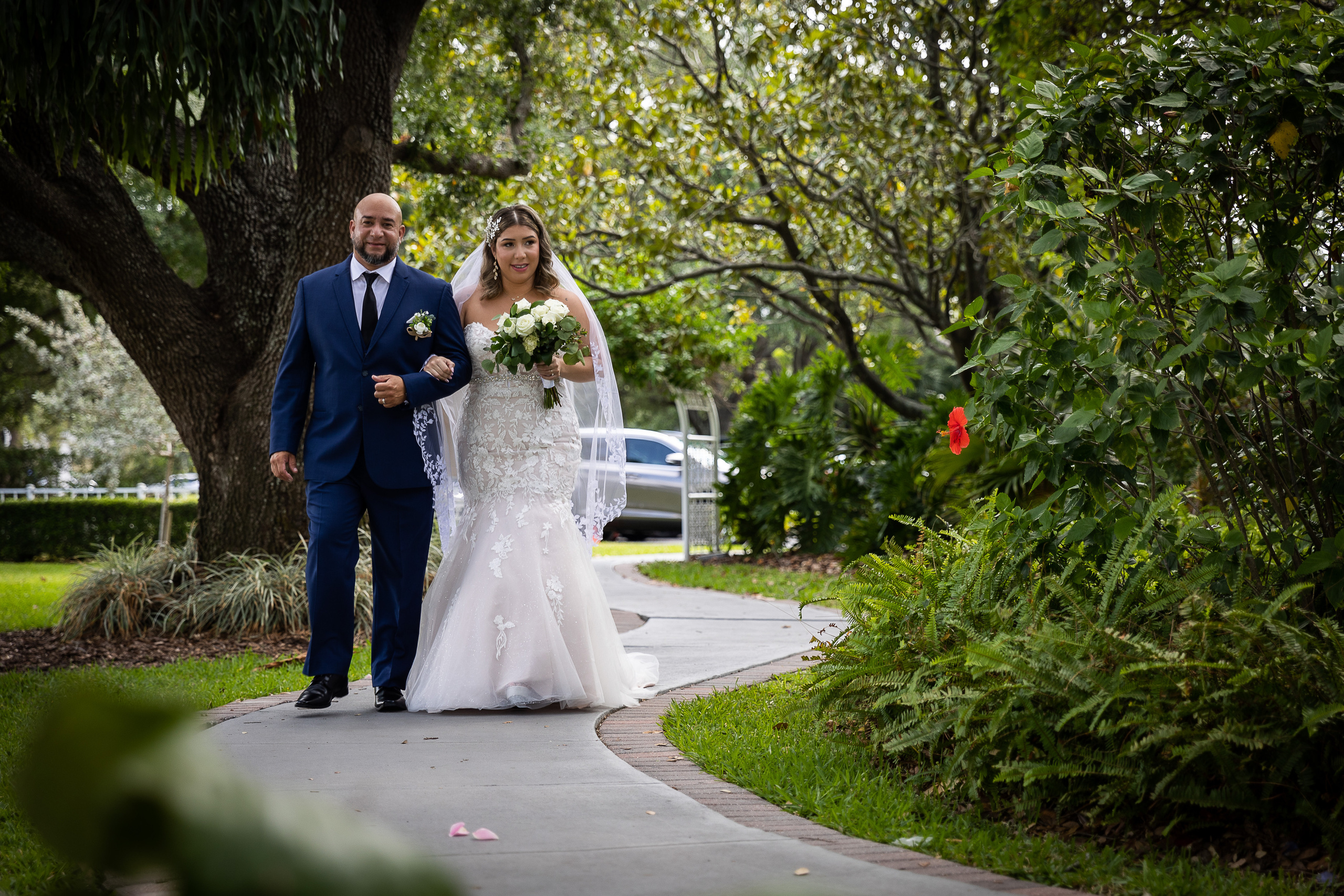 Walking down the isle at Wedding at Davis Island Garden Club, Tampa, FL