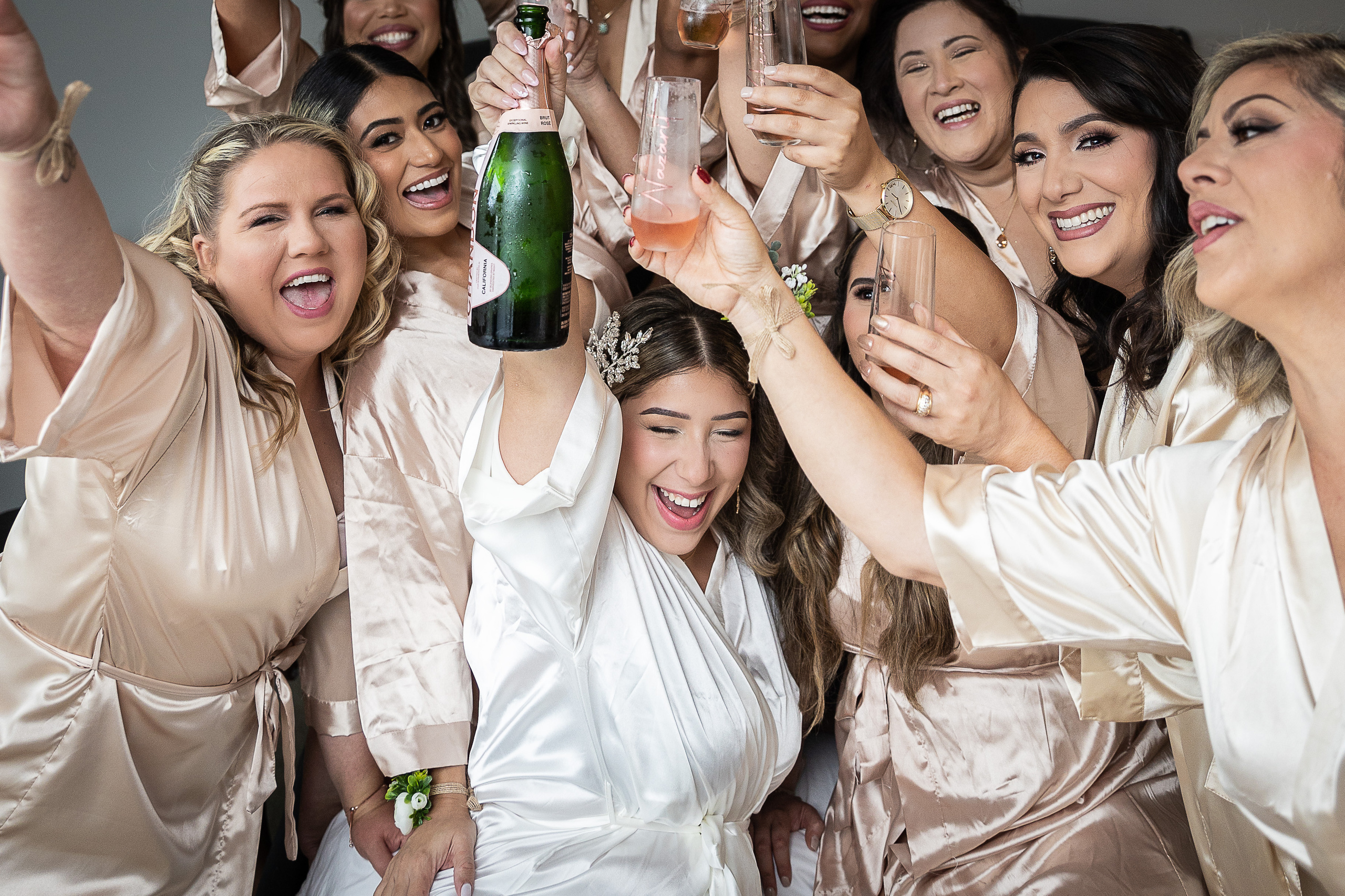 Bridesmaids and champagne bride morning
