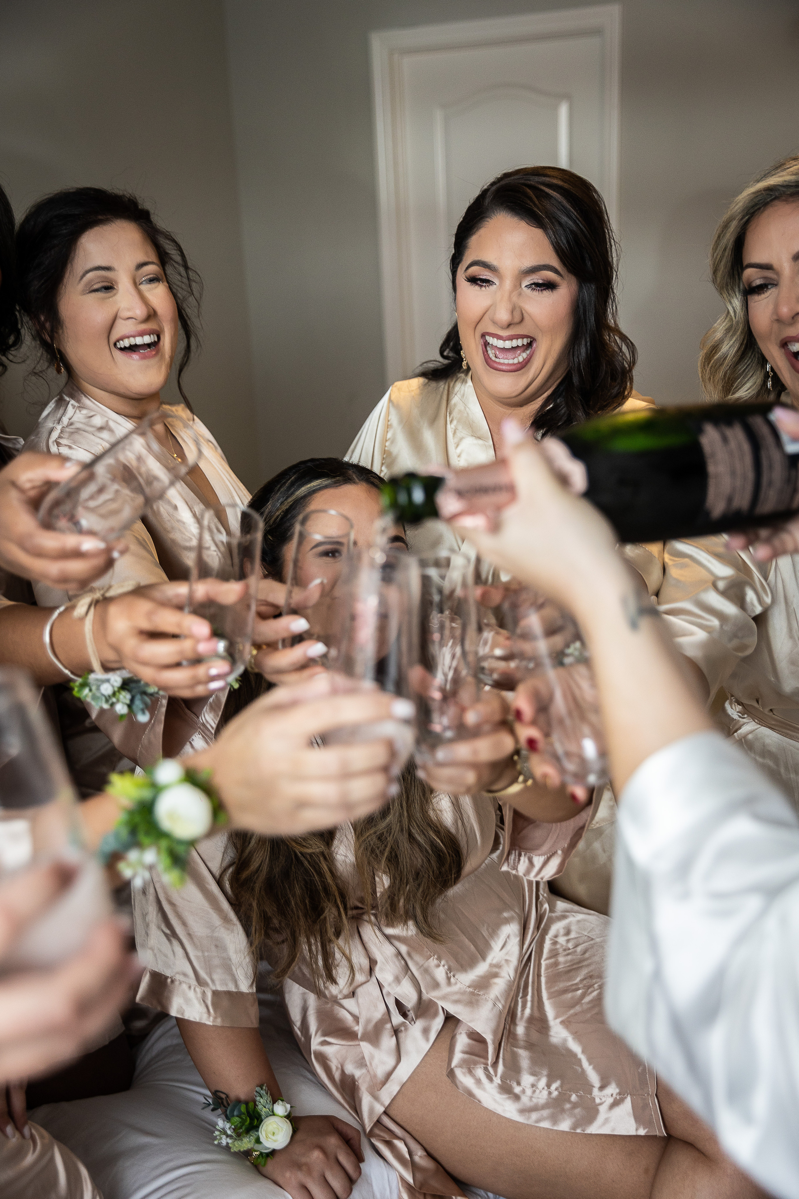 Bridesmaids and champagne bride morning